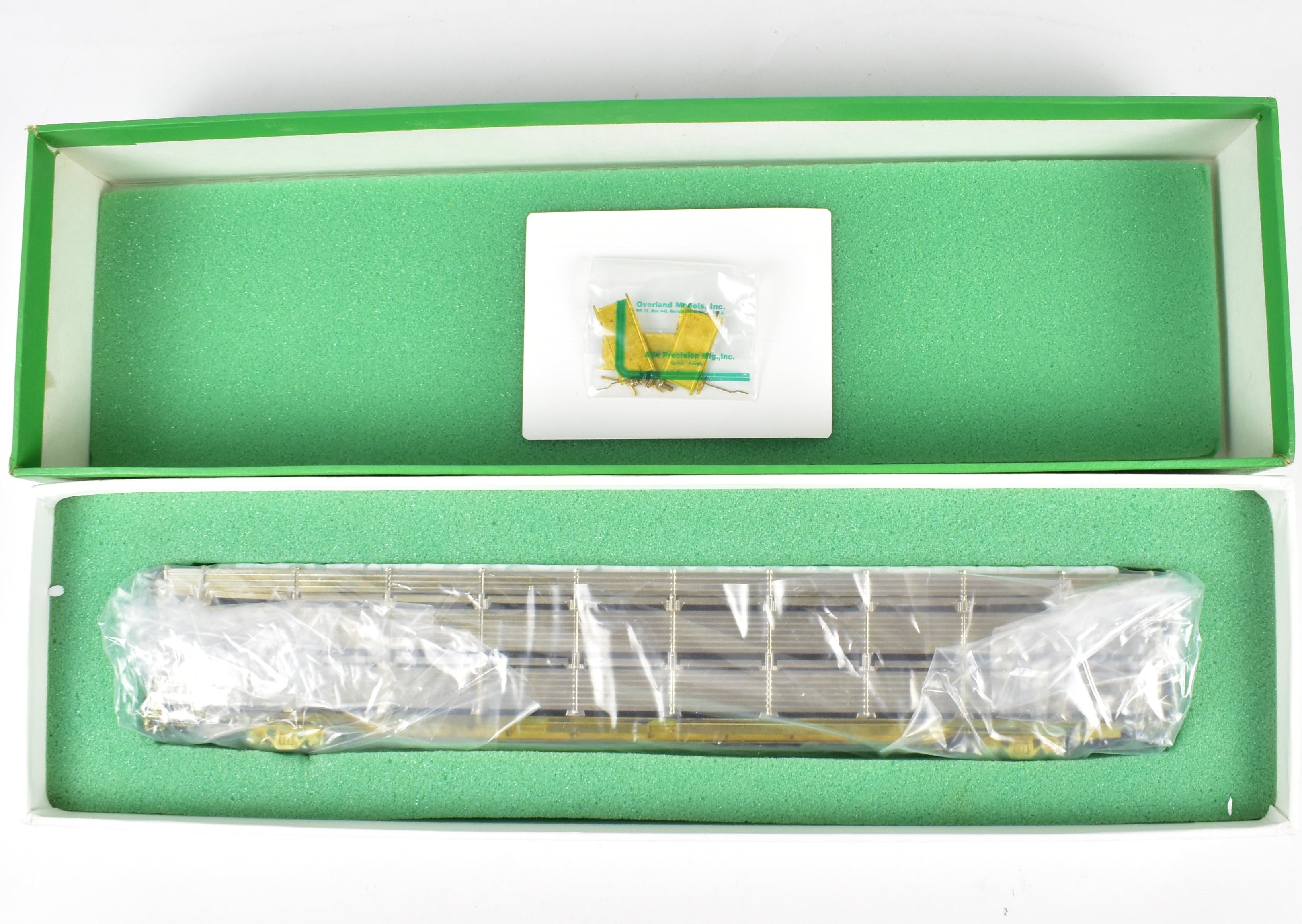 HO Scale Brass Tri - Level Auto Rack Model by Overland Models, Inc. (OMI) for Various Railroads like ATSF, BN, CR, N&W, and SP with Pressed Sides and Optional Roof