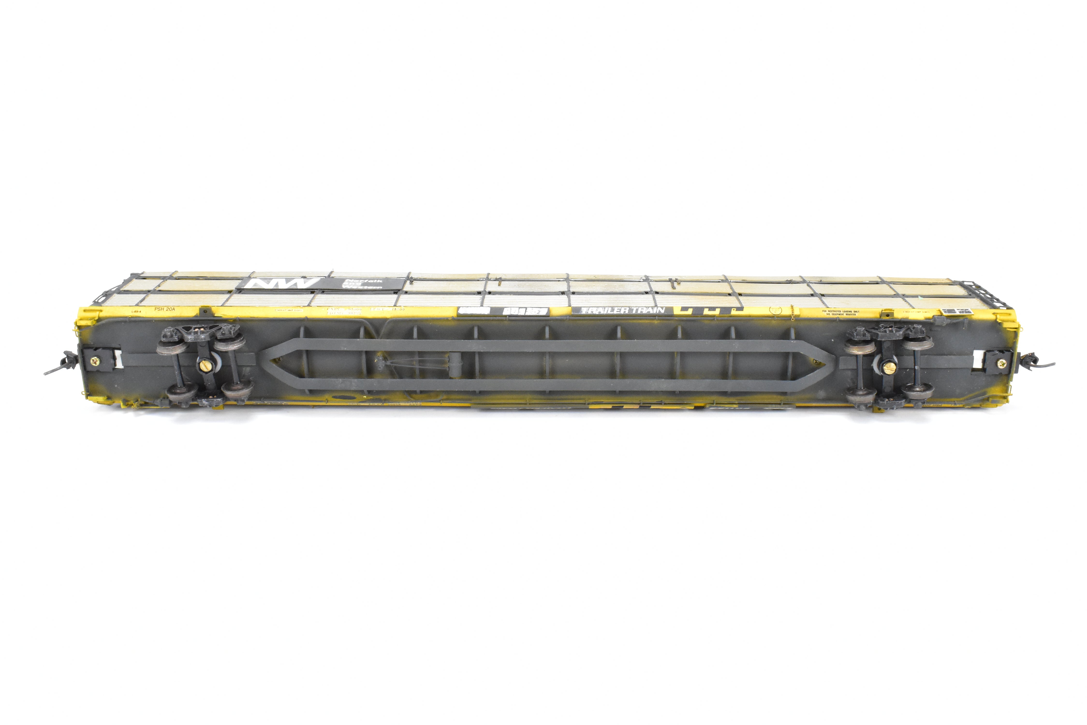 HO Scale Brass Model Tri-Level Auto Rack by Overland Models, Inc. (OMI) - Norfolk & Western Design with Pressed Sides, No Roof, C/P TTKX, and Lightly Weathered Appearance