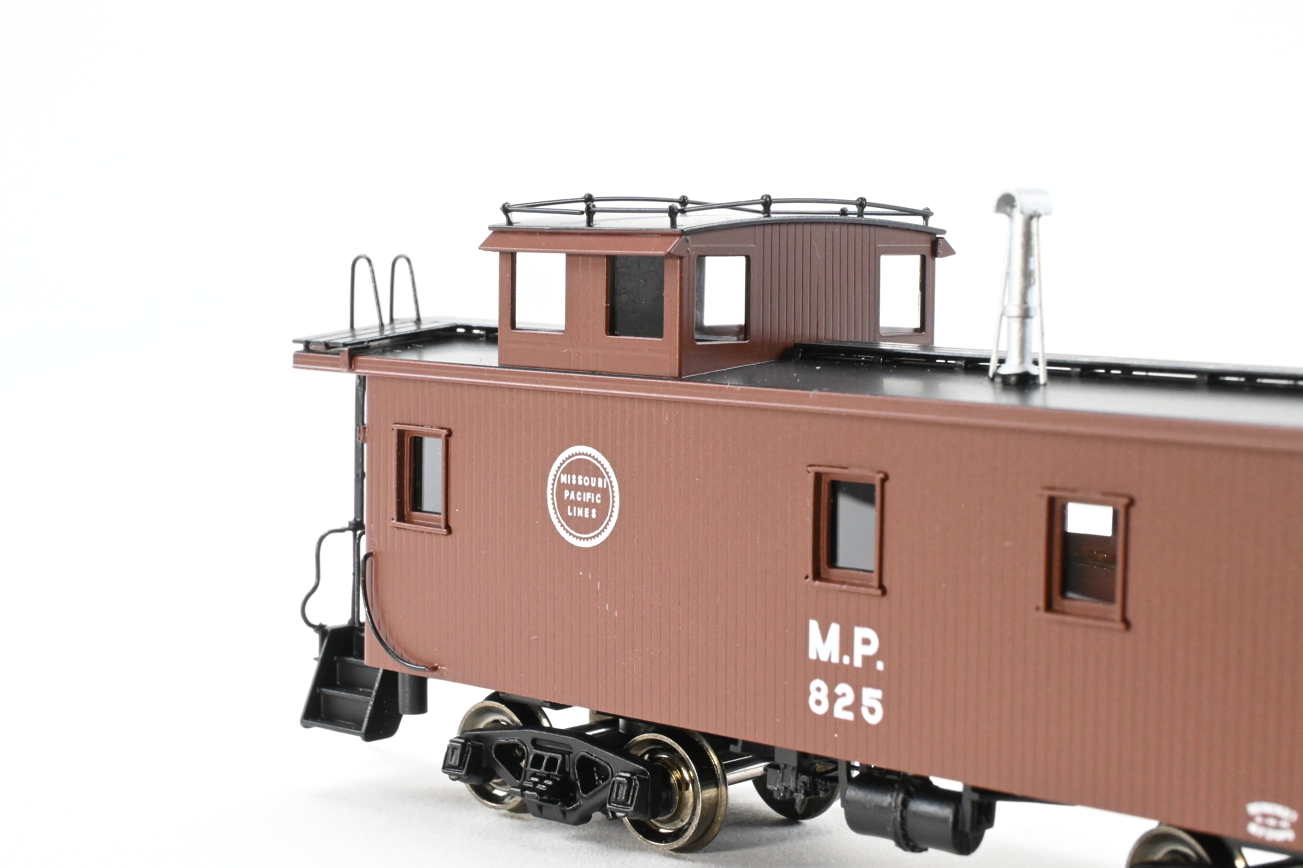 HO Scale Brass Missouri Pacific Wood - Side Caboose F/P #825 by OMI (Overland Models, Inc.)