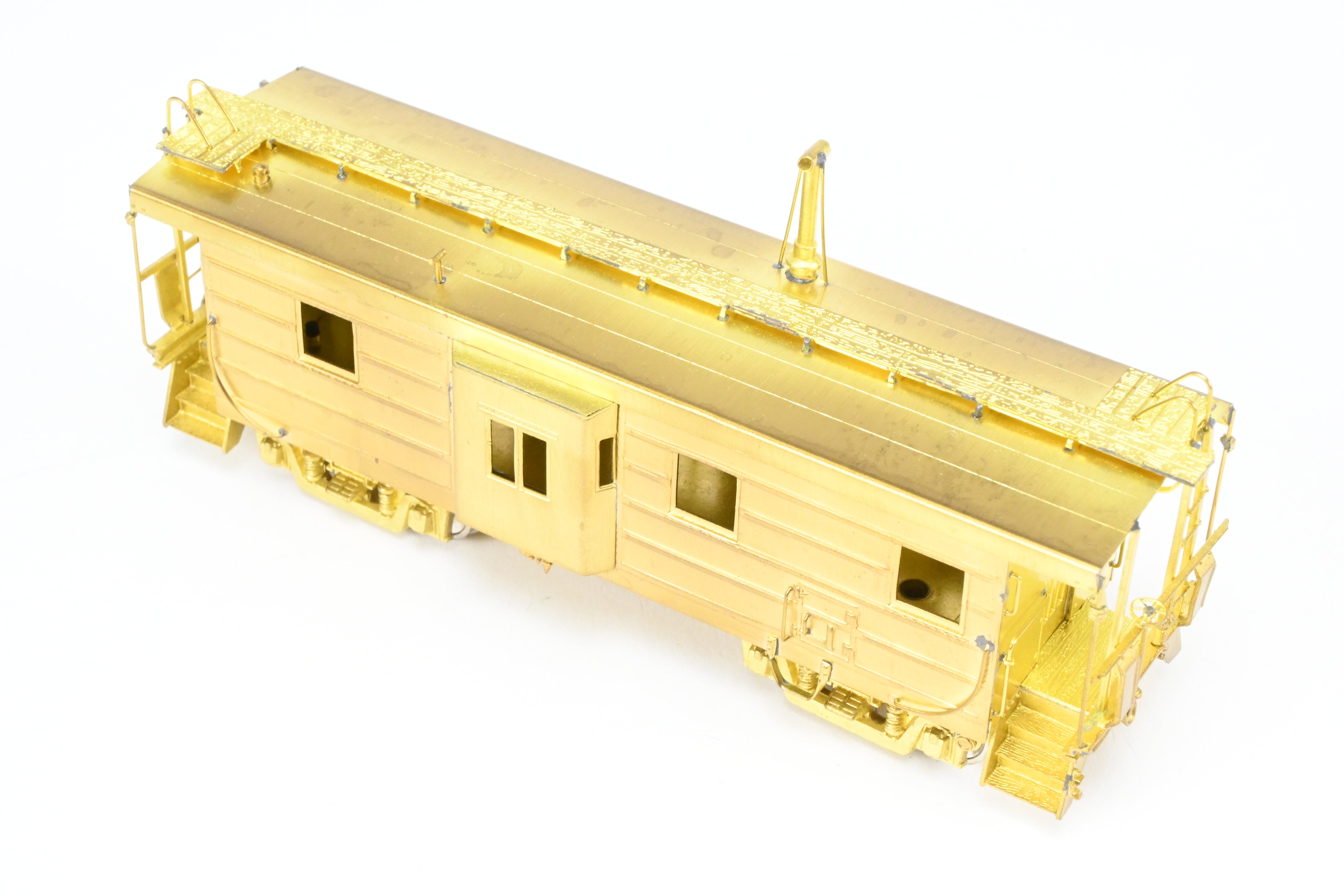 HO Scale Brass OMI - Overland Models, Inc. Milwaukee Road (MILW) Bay Window Caboose with Straight Trucks, 1984 Production Run Model