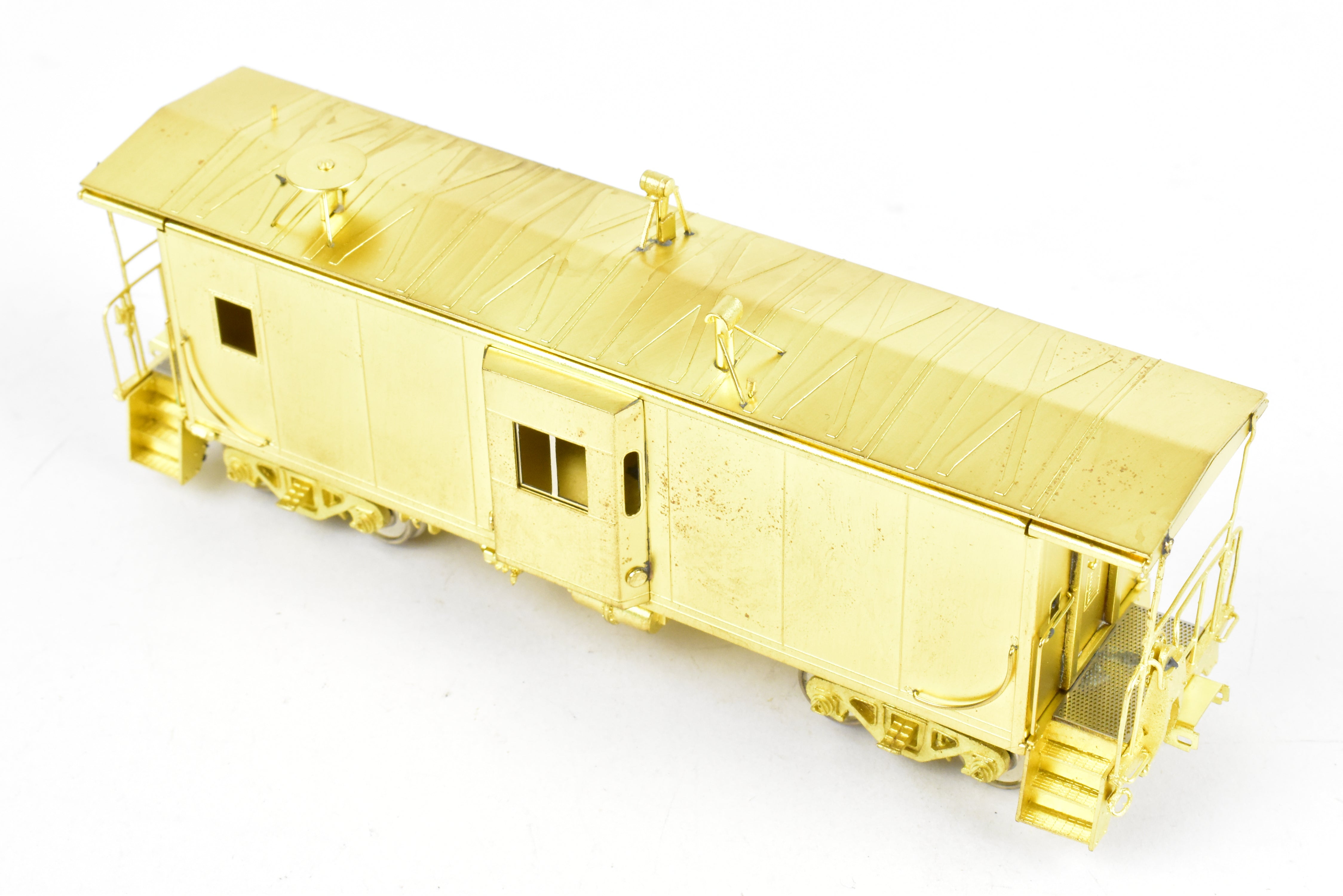 HO Scale Brass Model Train - Overland Models, Inc. (OMI) Southern Pacific (SP) C 50 - 7 Bay Window Caboose in the Series of #4600 - 4659