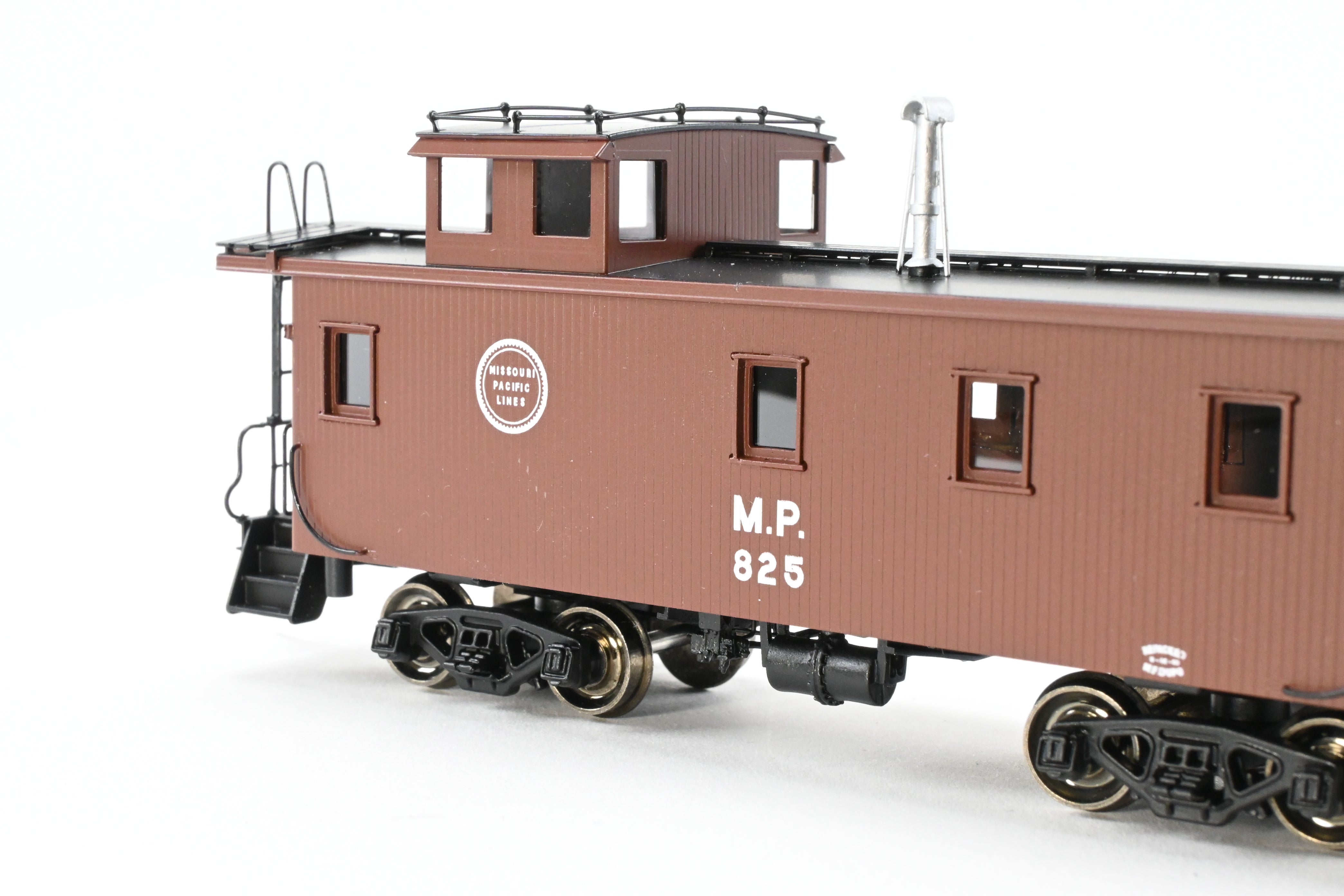 HO Scale Brass Missouri Pacific Wood - Side Caboose F/P #825 by OMI (Overland Models, Inc.)