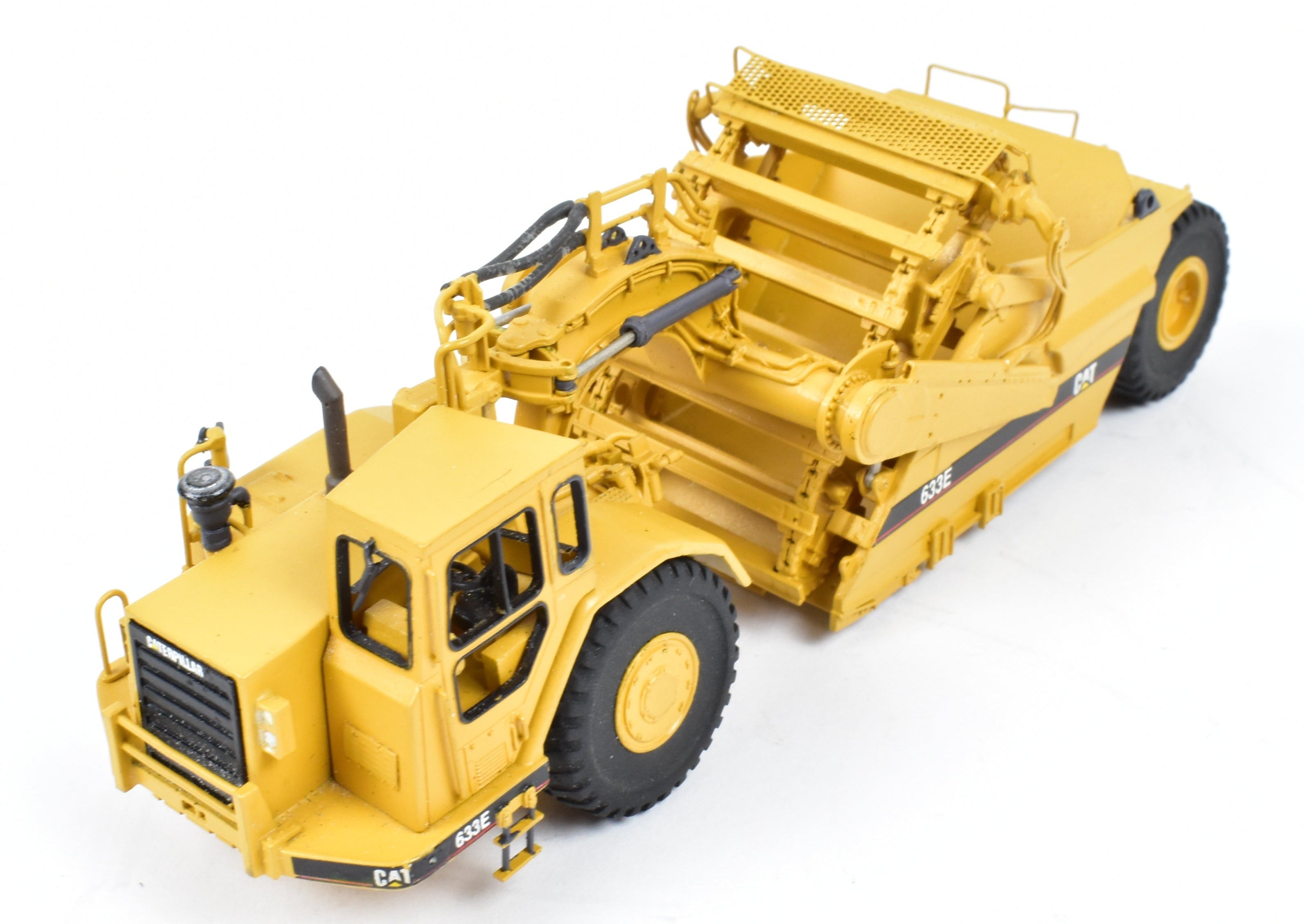 High - Quality HO Scale Brass Construction Model - Factory - Painted Yellow Caterpillar 633E Scraper by CCM Models