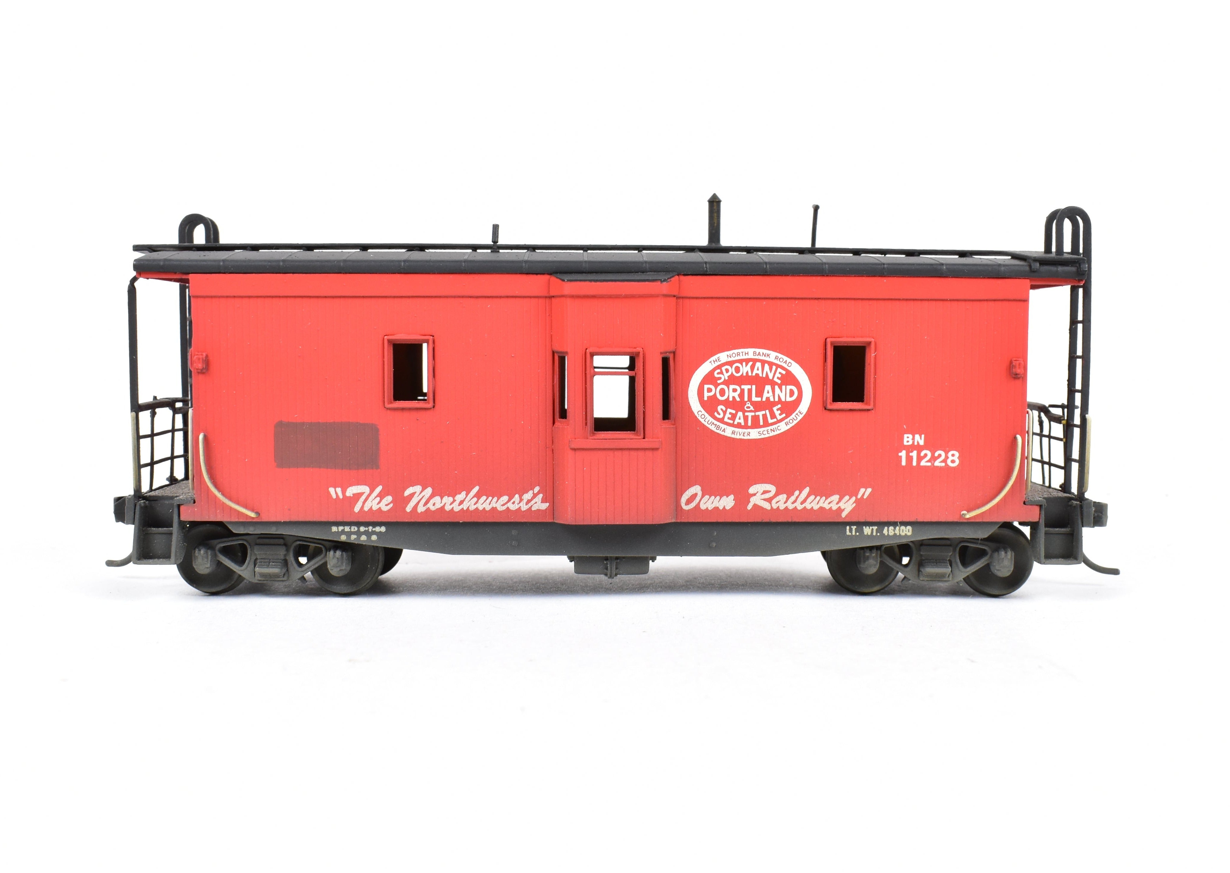 HO Scale Brass OMI - Overland Models, Inc. Model Train Spokane Portland & Seattle Wood Bay Window Caboose with Burlington Northern #11228 Design