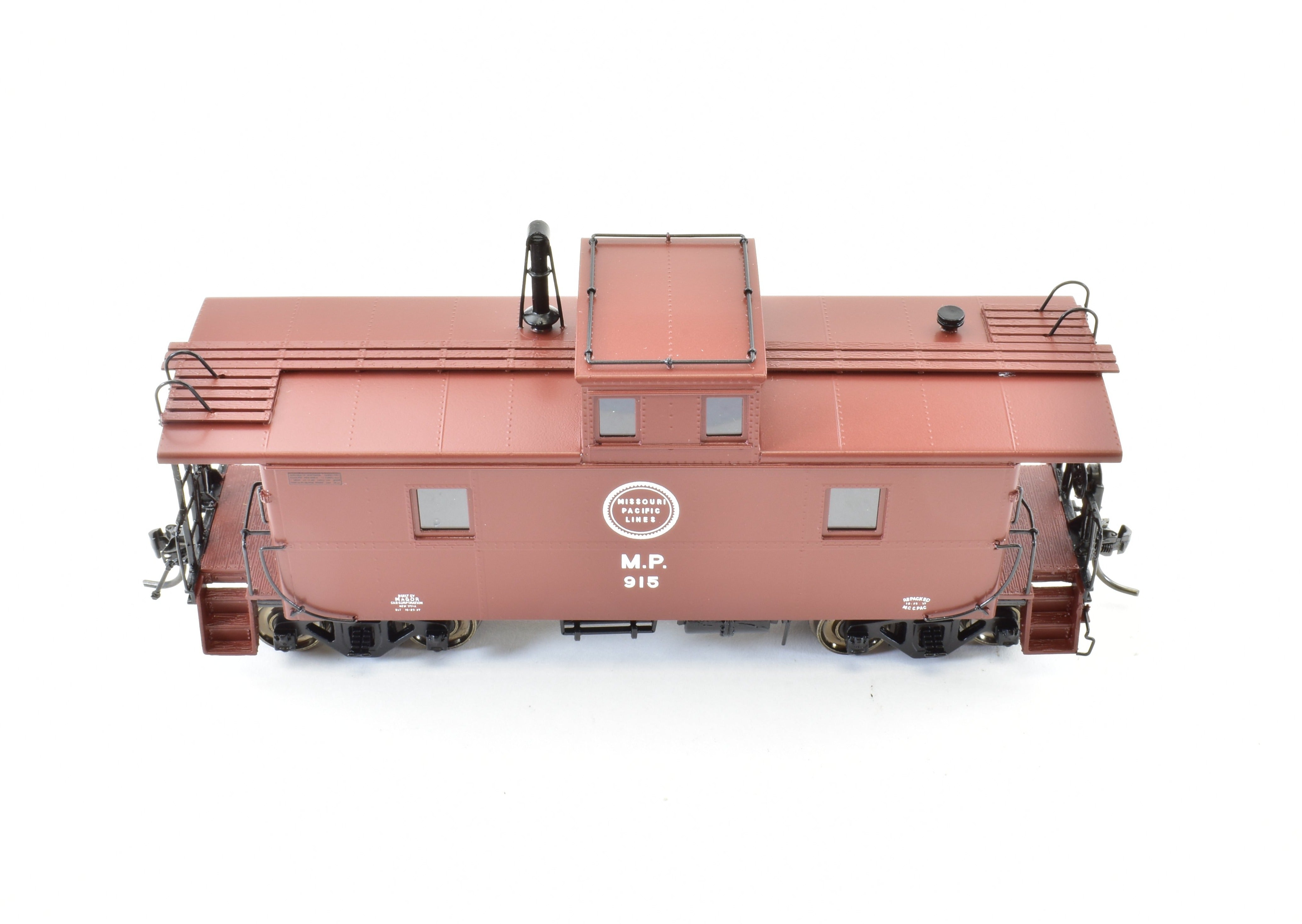 HO Scale Brass OMI - Overland Models, Inc. Missouri Pacific Magor Steel Caboose Model As Built in 1937, Factory Painted with Red and Small White Herald Scheme