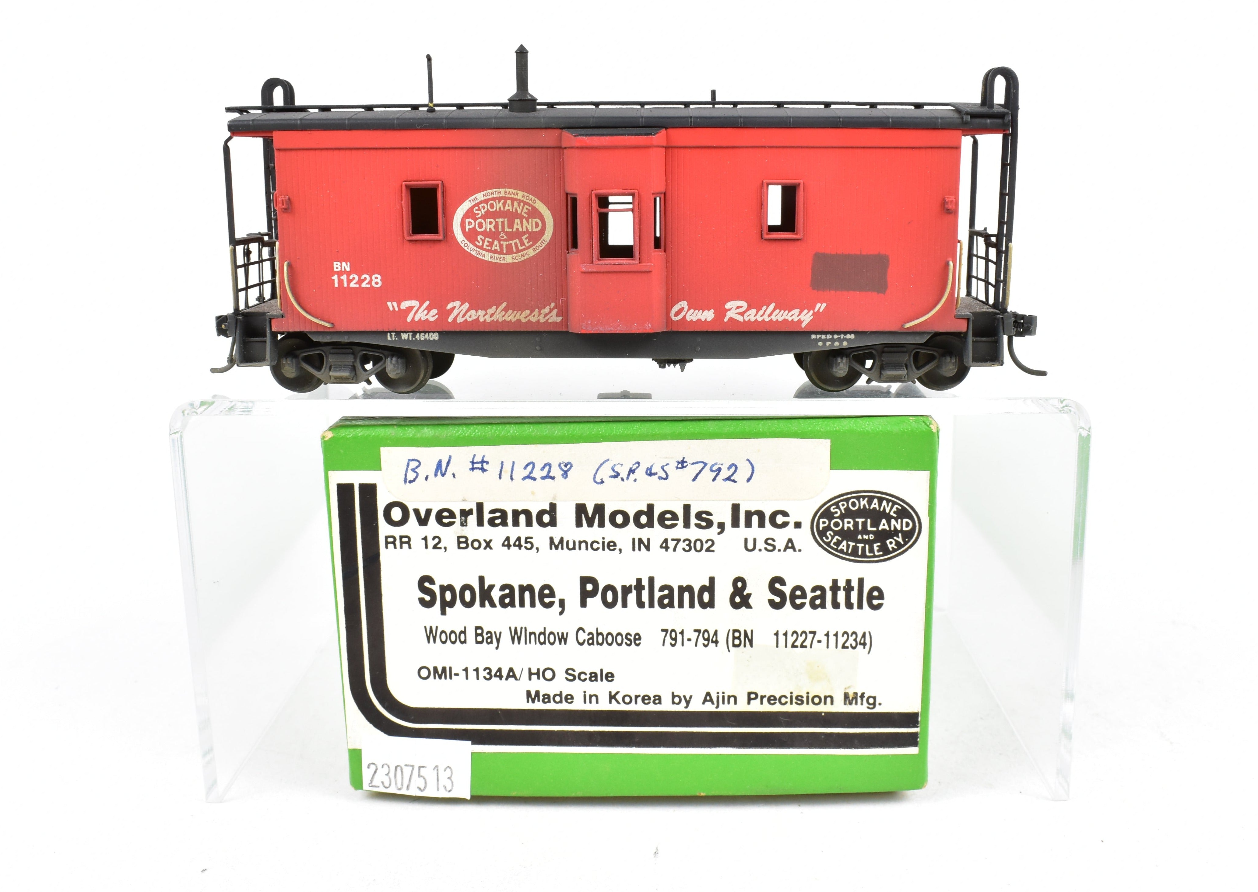 HO Scale Brass OMI - Overland Models, Inc. Model Train Spokane Portland & Seattle Wood Bay Window Caboose with Burlington Northern #11228 Design
