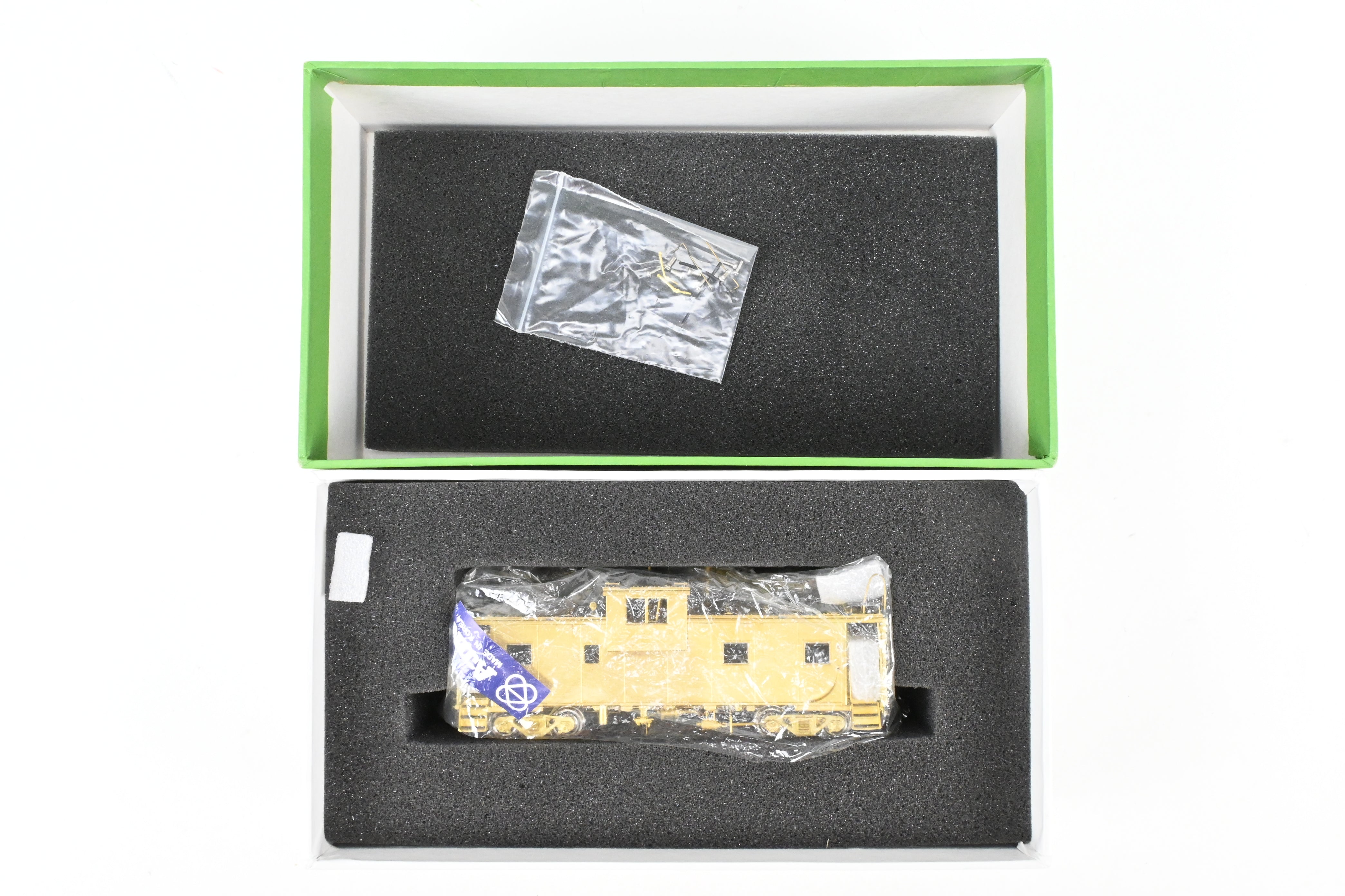 HO Scale Brass Connecting OMI - Overland Models, Inc. Spokane, Portland & Seattle International Wide Vision Caboose Model for Railroad Enthusiasts
