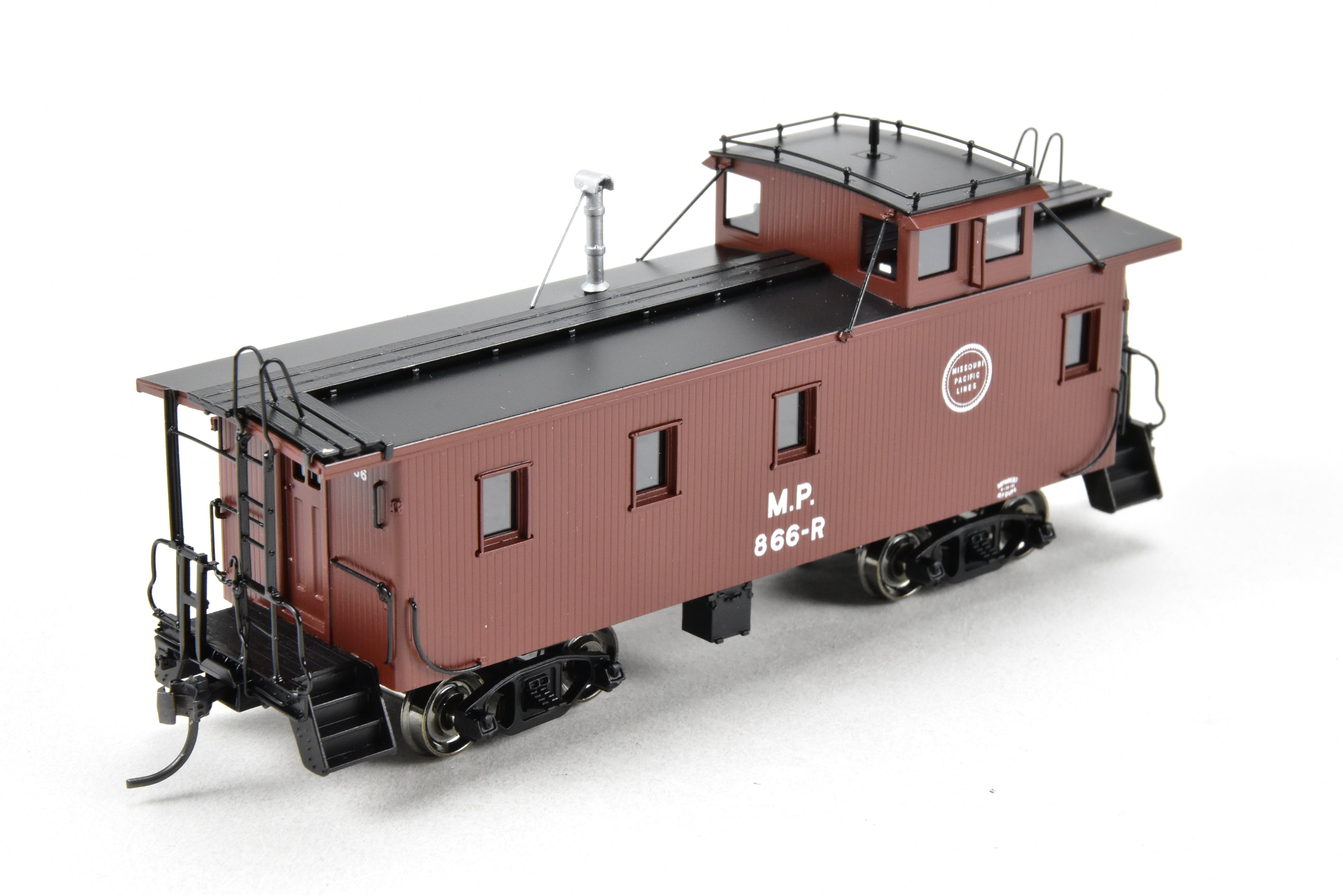 HO Scale Brass Missouri Pacific Wood - Side Caboose Model by Overland Models, Inc. with Angled Braces on Cupola and Antenna on Roof, Model Number #866R
