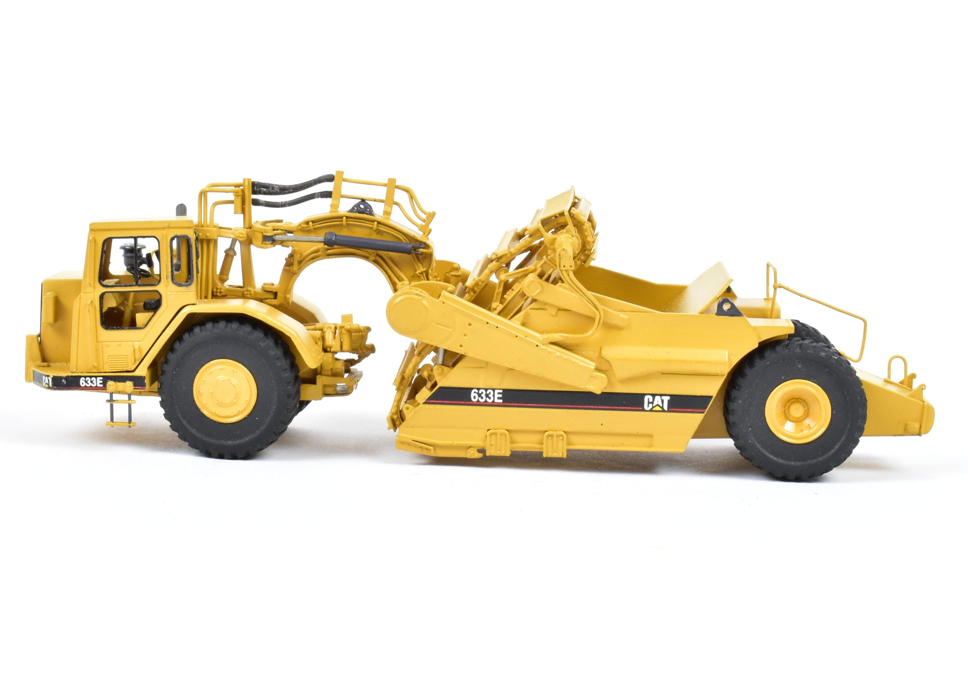 High - Quality HO Scale Brass Construction Model - Factory - Painted Yellow Caterpillar 633E Scraper by CCM Models