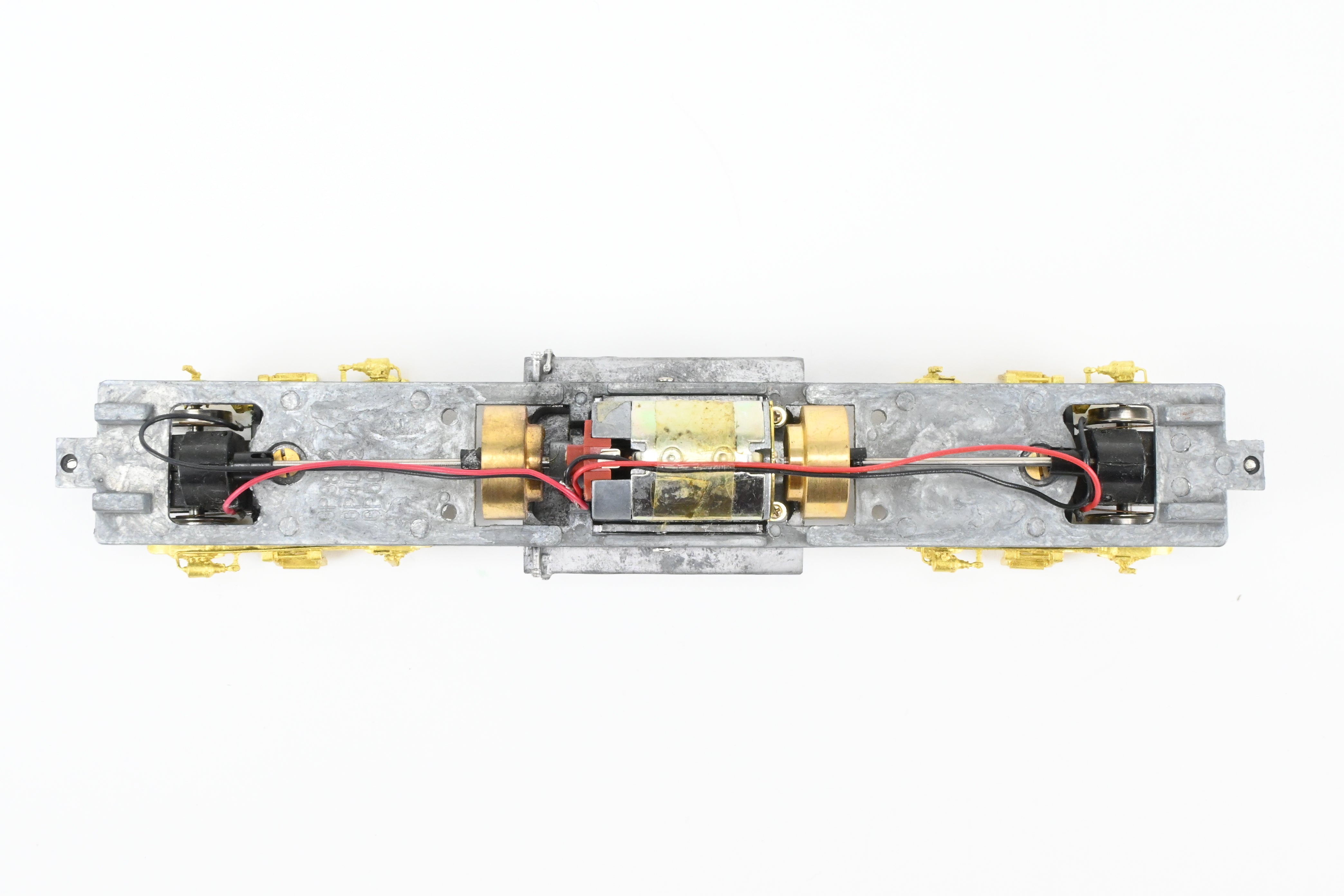 HO Scale Brass Model Train Drive Systems by Overland Models Inc. for EMD GP38-2 Locomotives with Blomberg M Trucks and Medium Fuel Tank - Various Road Configurations