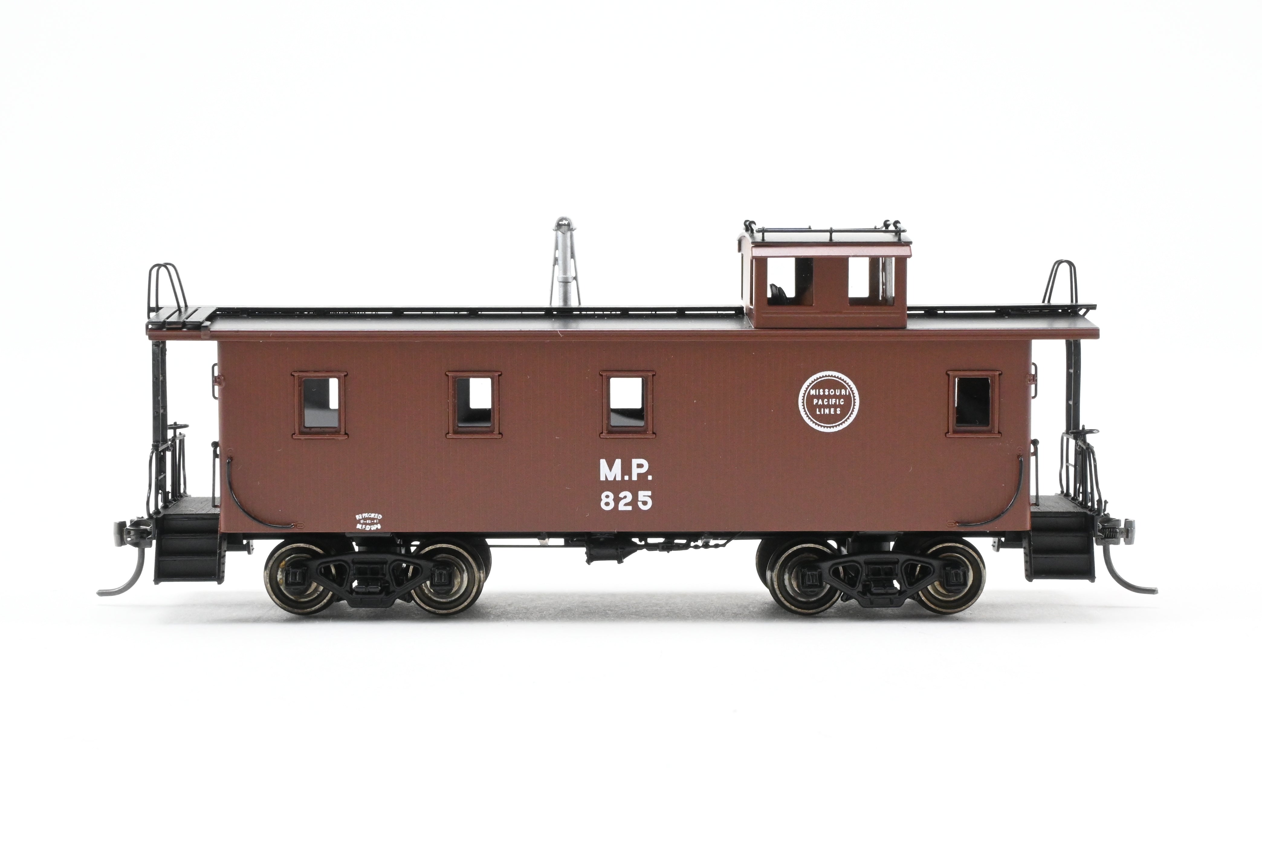 HO Scale Brass Missouri Pacific Wood - Side Caboose F/P #825 by OMI (Overland Models, Inc.)