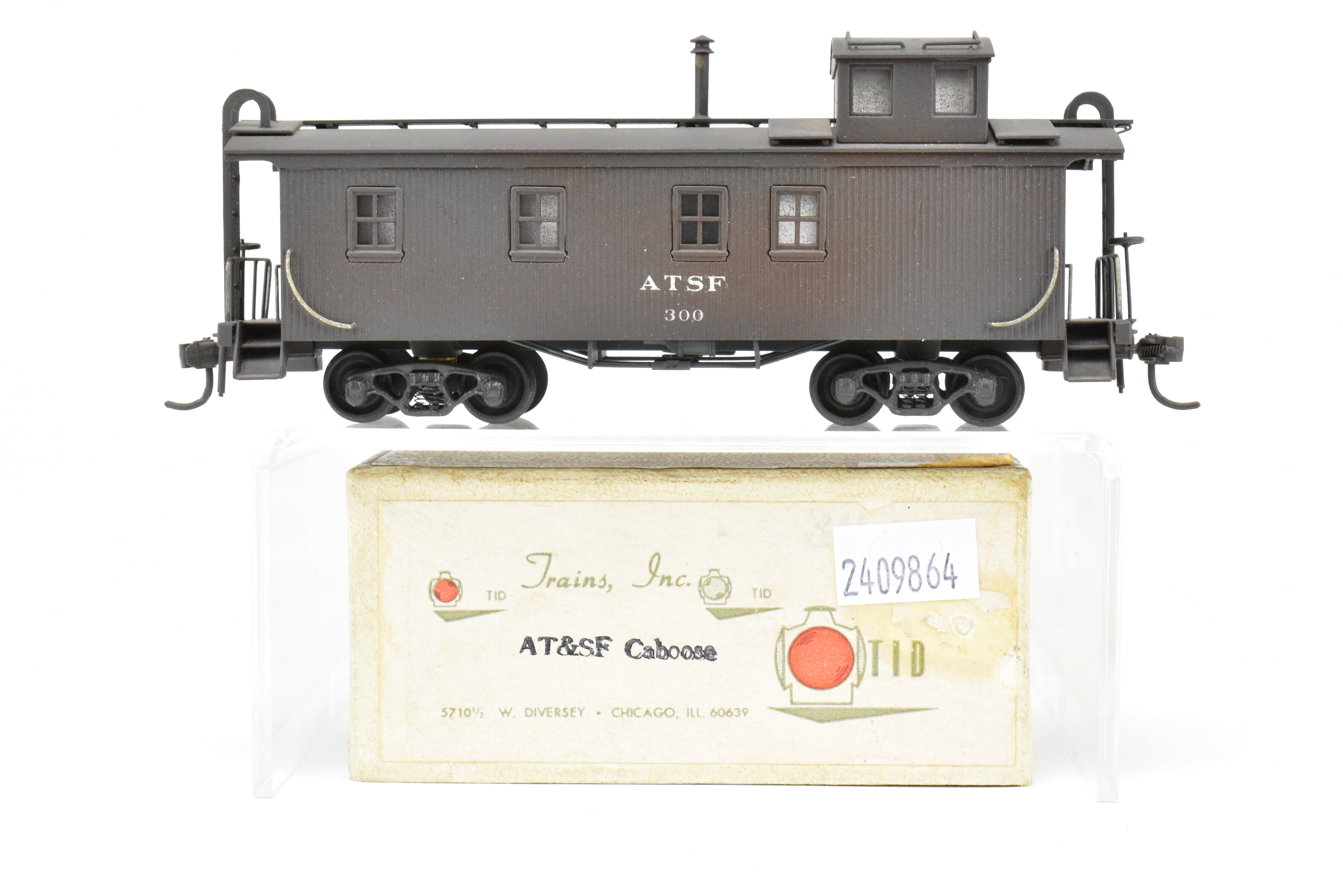 HO Scale Brass Model Trains by Trains, Inc. - ATSF Santa Fe Wood Caboose Custom Painted and Weathered, Number 300