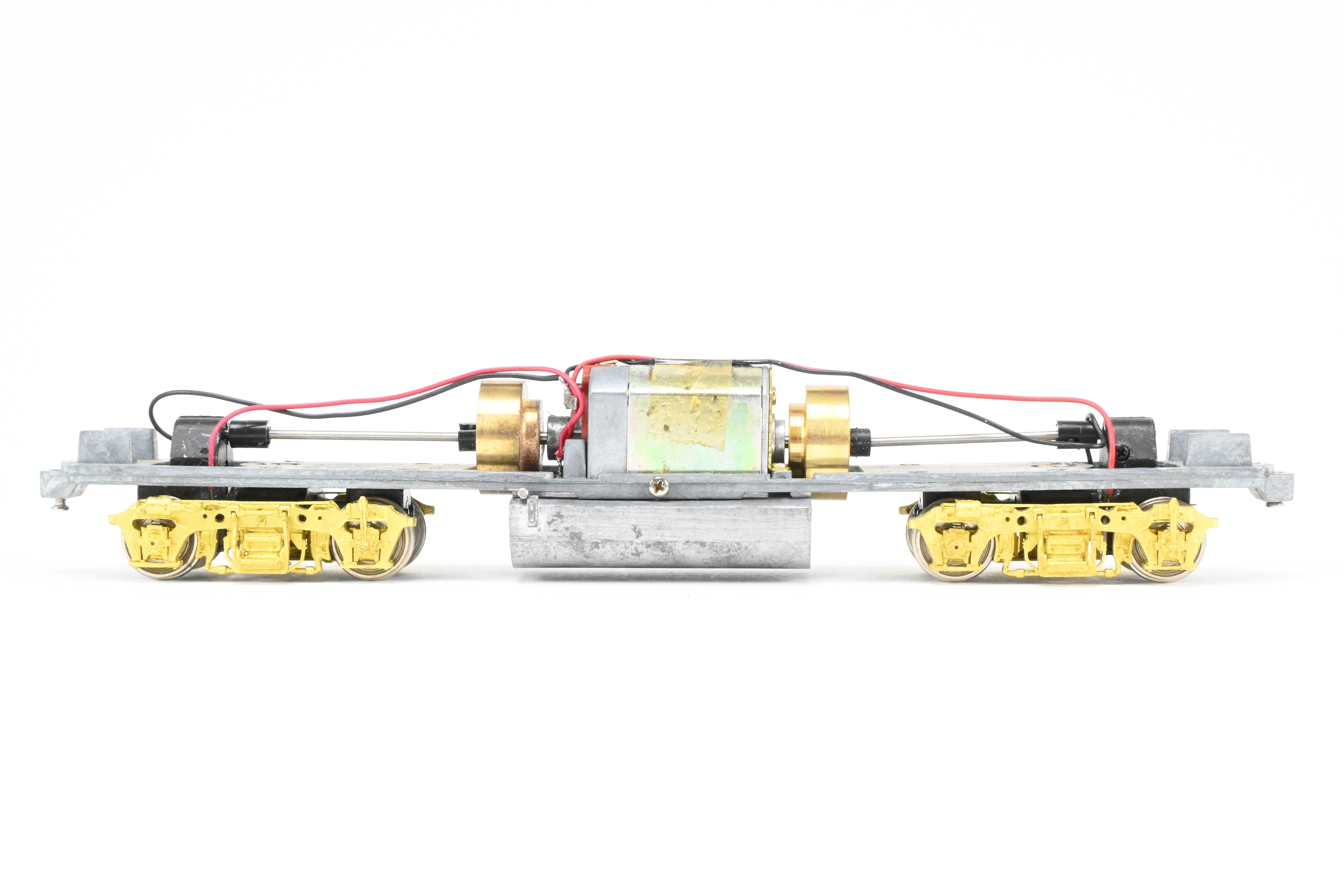 HO Scale Brass Model Train Drive Systems by Overland Models Inc. for EMD GP38-2 Locomotives with Blomberg M Trucks and Medium Fuel Tank - Various Road Configurations