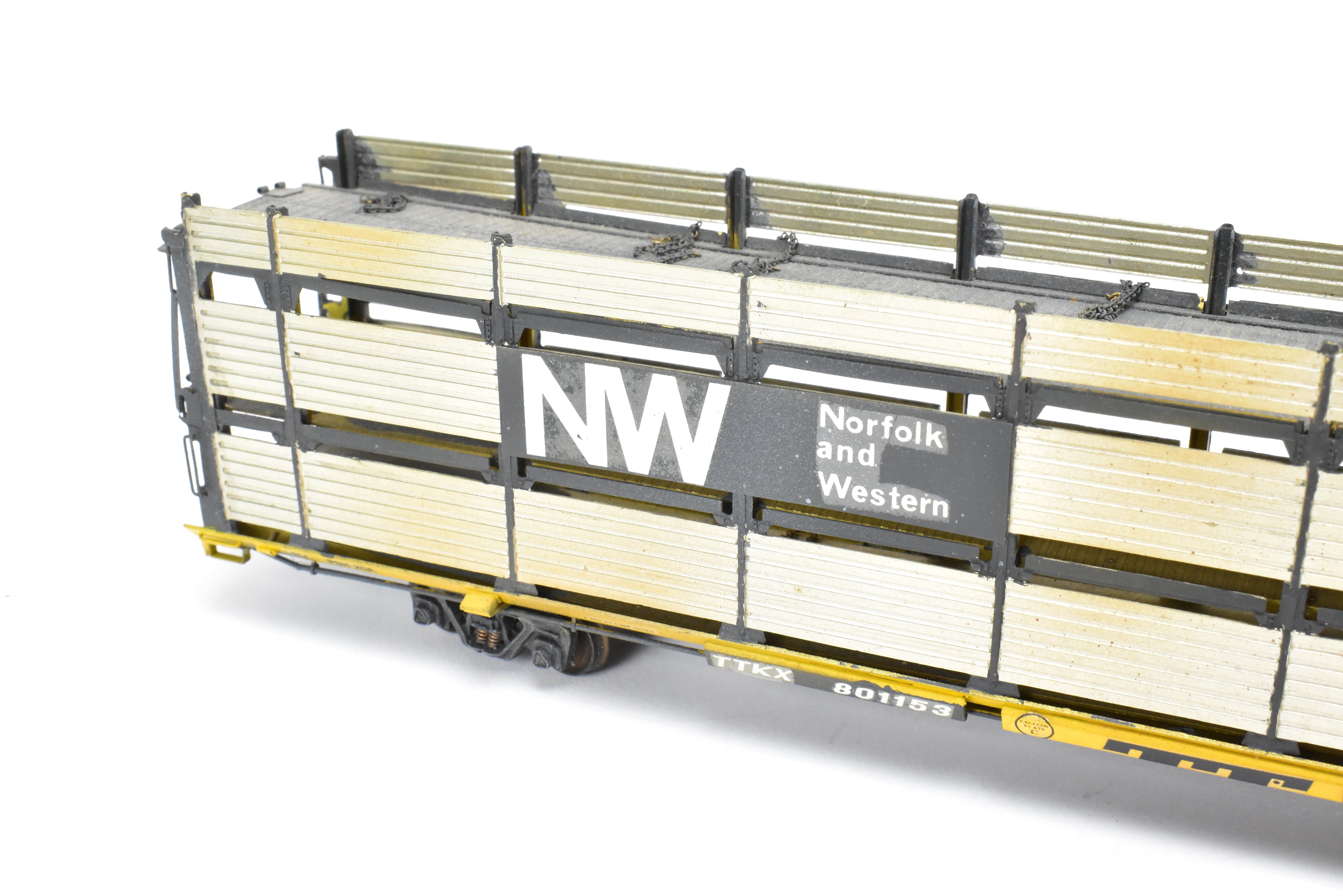 HO Scale Brass Model Tri-Level Auto Rack by Overland Models, Inc. (OMI) - Norfolk & Western Design with Pressed Sides, No Roof, C/P TTKX, and Lightly Weathered Appearance
