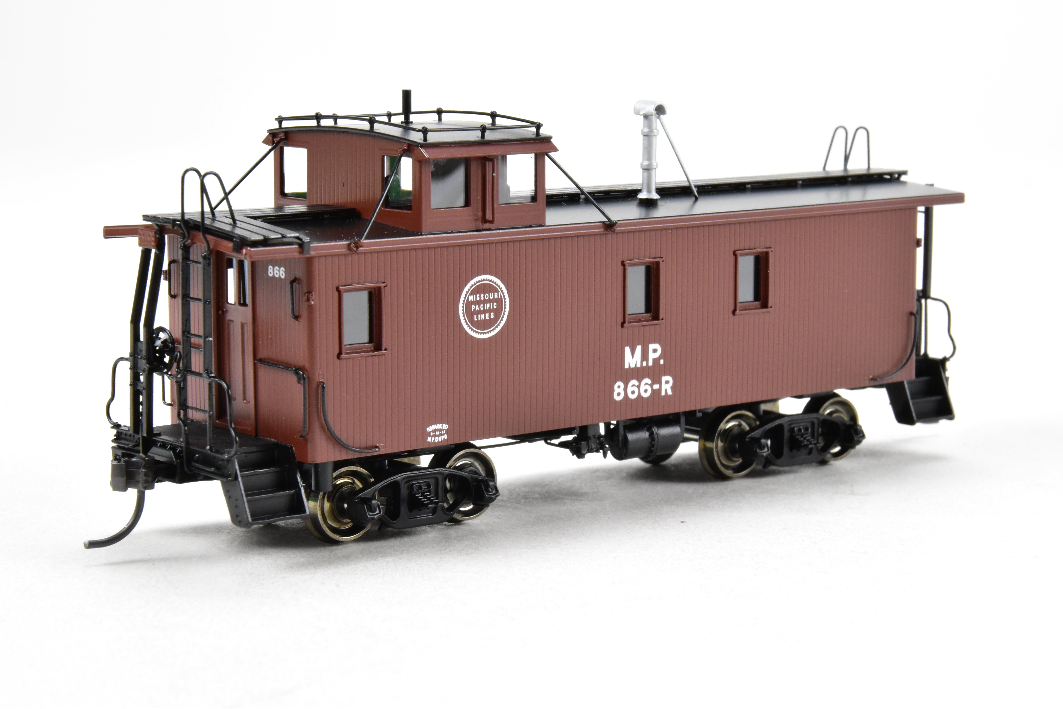 HO Scale Brass Missouri Pacific Wood - Side Caboose Model by Overland Models, Inc. with Angled Braces on Cupola and Antenna on Roof, Model Number #866R