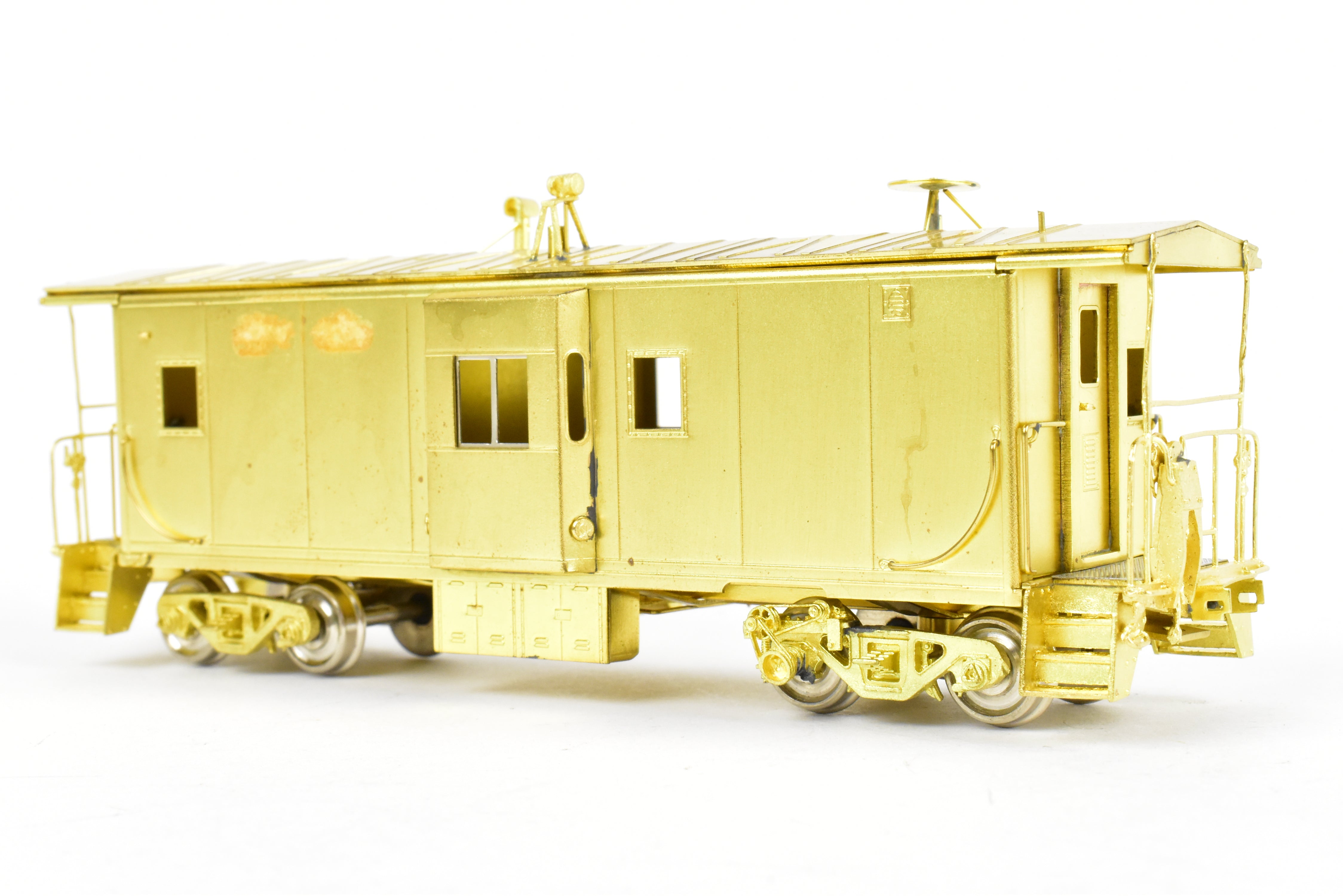 HO Scale Brass Model Train - Overland Models, Inc. (OMI) Southern Pacific (SP) C 50 - 7 Bay Window Caboose in the Series of #4600 - 4659