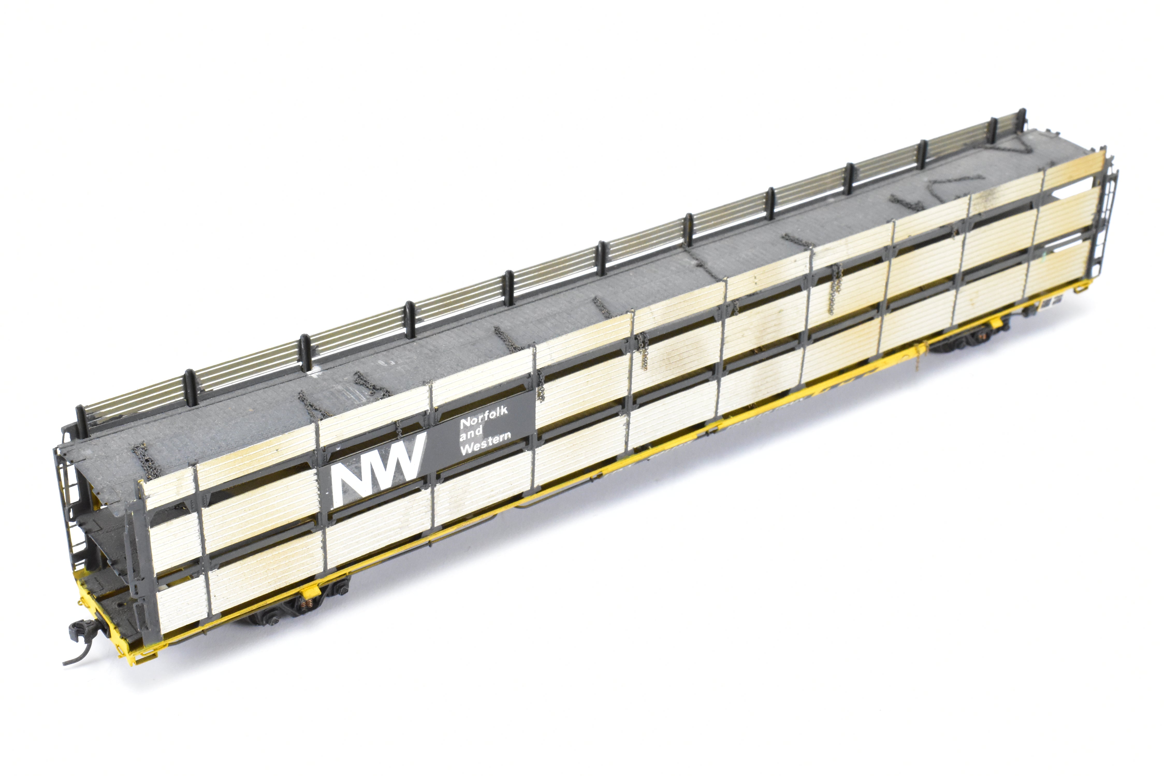HO Scale Brass Model Tri-Level Auto Rack by Overland Models, Inc. (OMI) - Norfolk & Western Design with Pressed Sides, No Roof, C/P TTKX, and Lightly Weathered Appearance