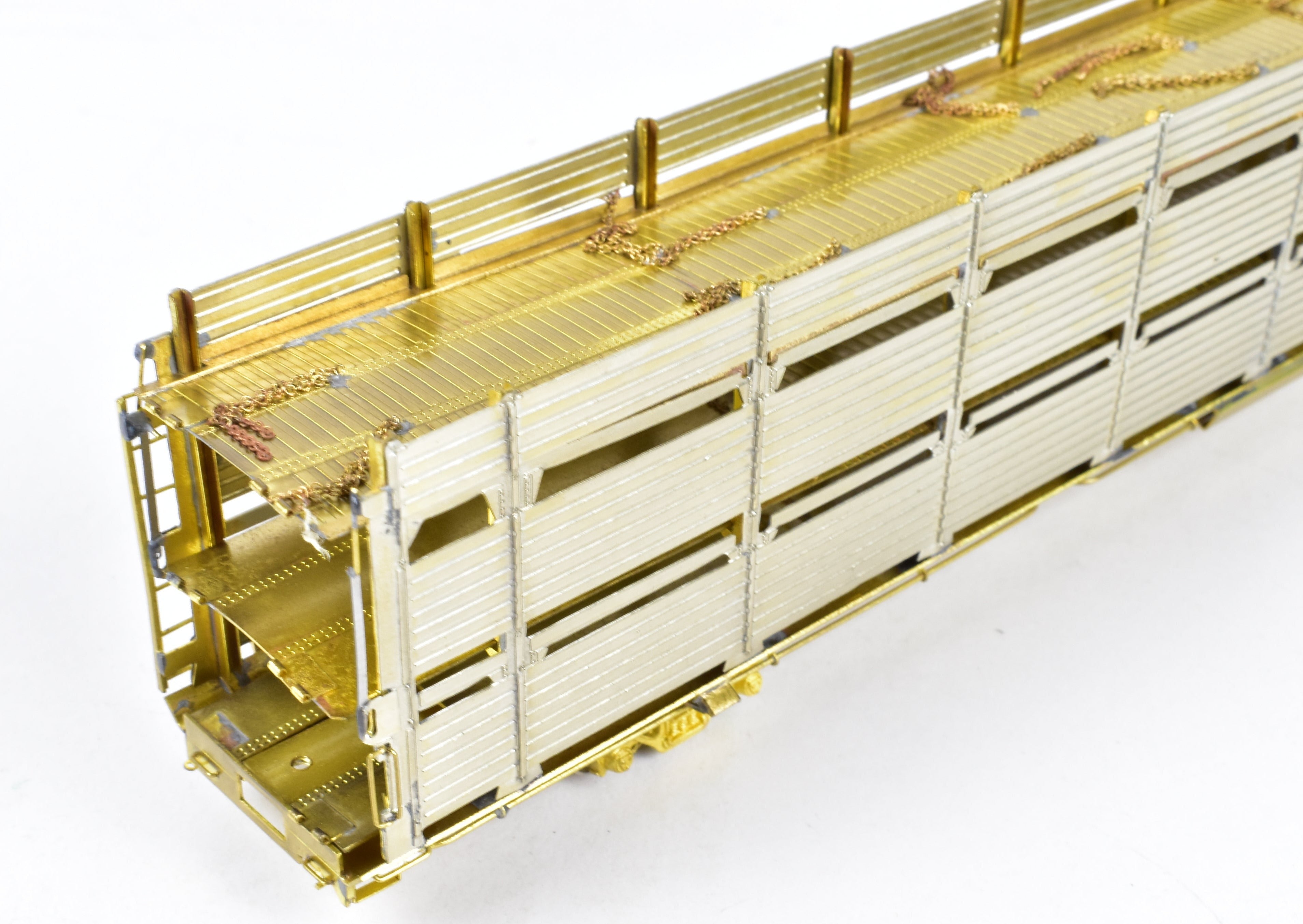 HO Scale Brass Tri - Level Auto Rack Model by Overland Models, Inc. (OMI) for Various Railroads like ATSF, BN, CR, N&W, and SP with Pressed Sides and Optional Roof