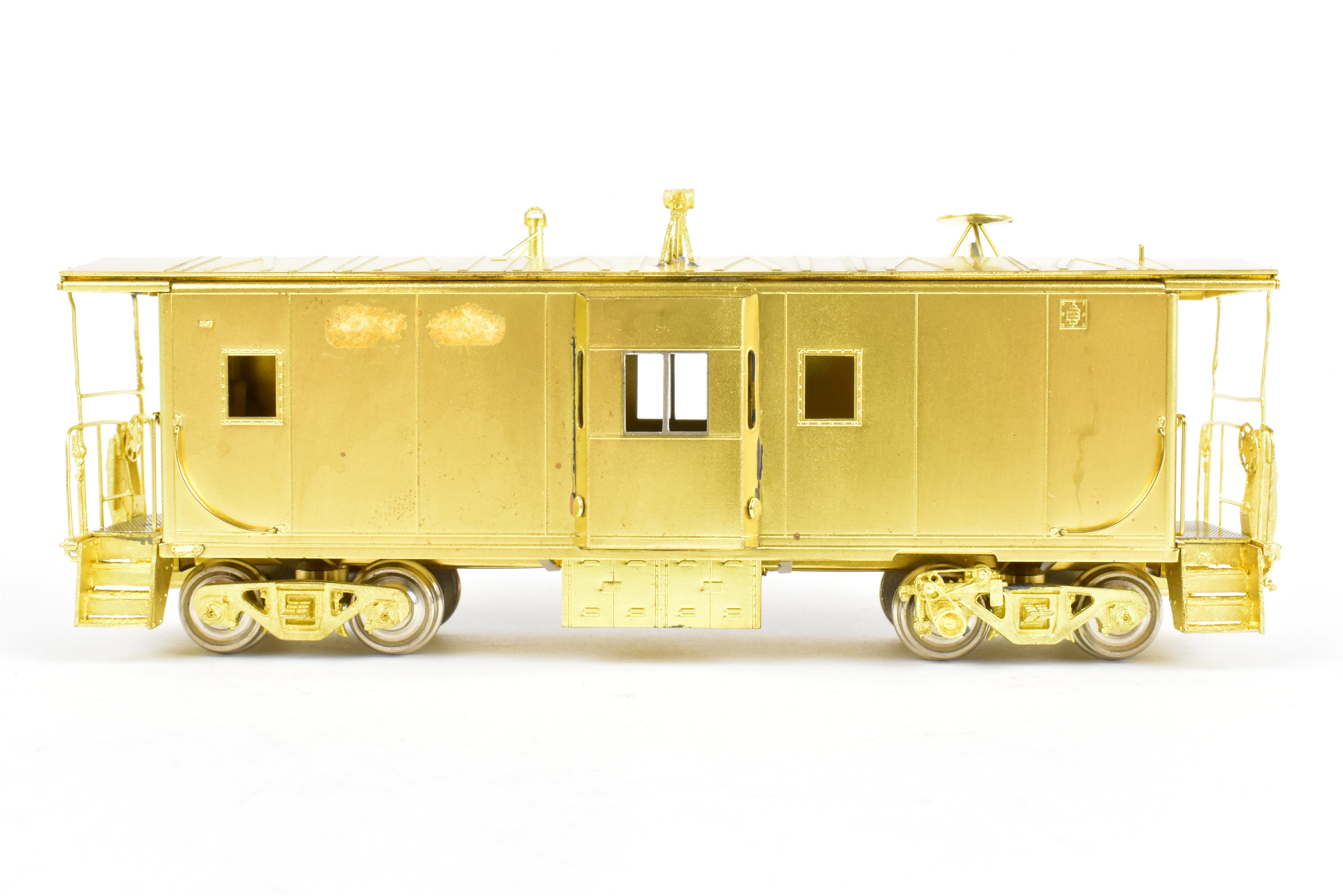 HO Scale Brass Model Train - Overland Models, Inc. (OMI) Southern Pacific (SP) C 50 - 7 Bay Window Caboose in the Series of #4600 - 4659