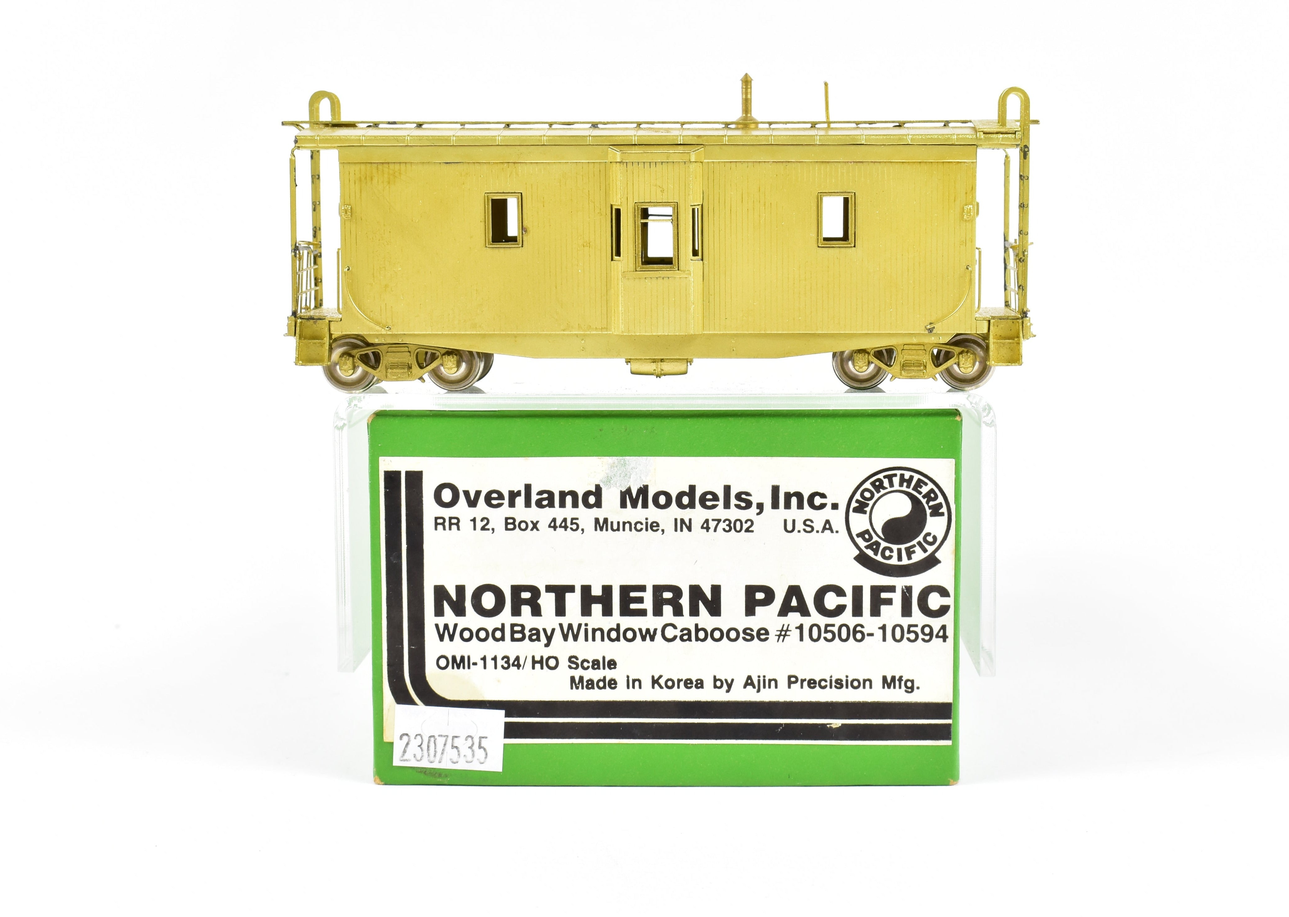 HO Scale Brass Northern Pacific Wood Bay Window Caboose Model #10506 - 10594 by Overland Models, Inc. (OMI)