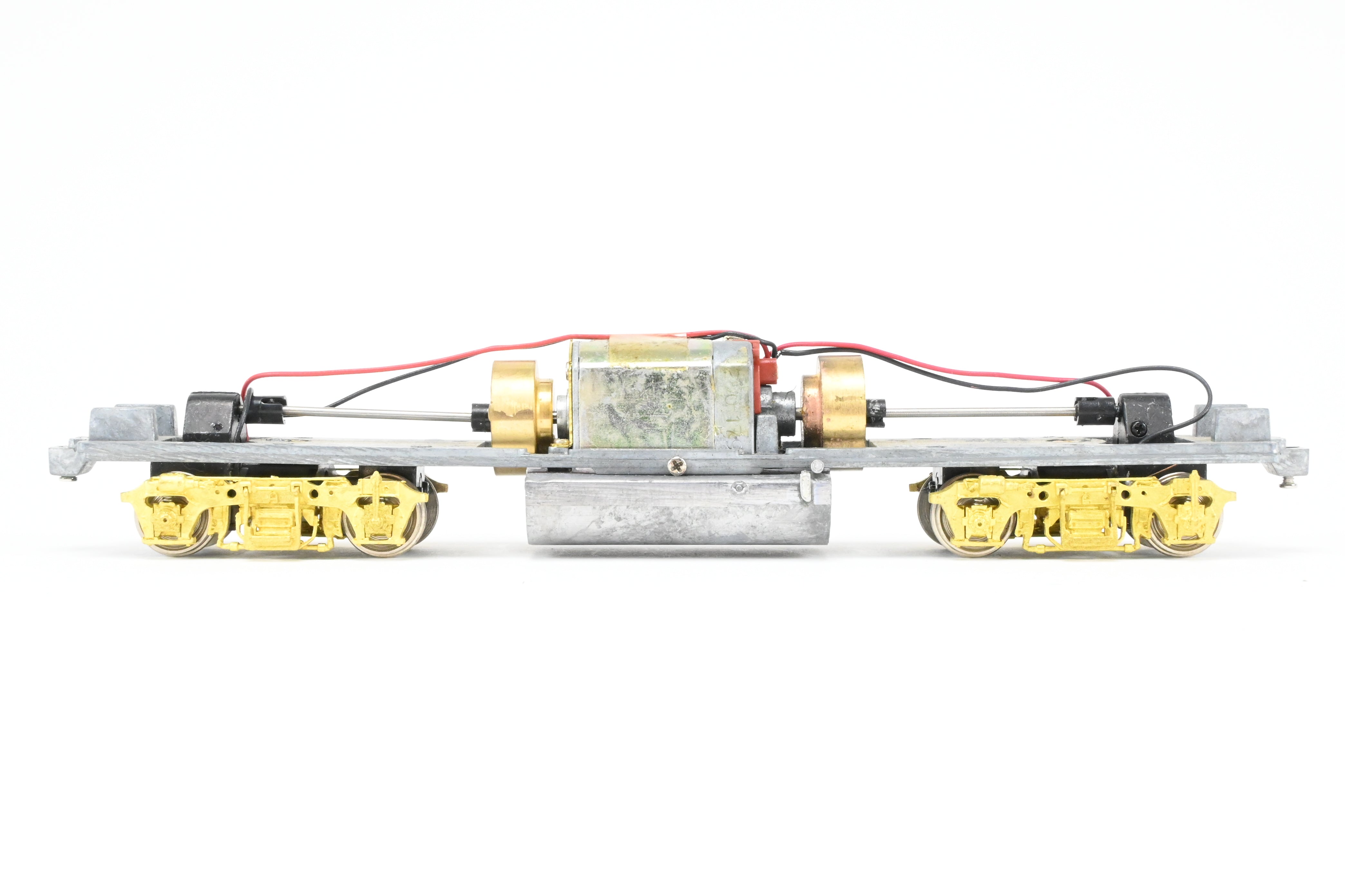 HO Scale Brass Model Train Drive Systems by Overland Models Inc. for EMD GP38-2 Locomotives with Blomberg M Trucks and Medium Fuel Tank - Various Road Configurations