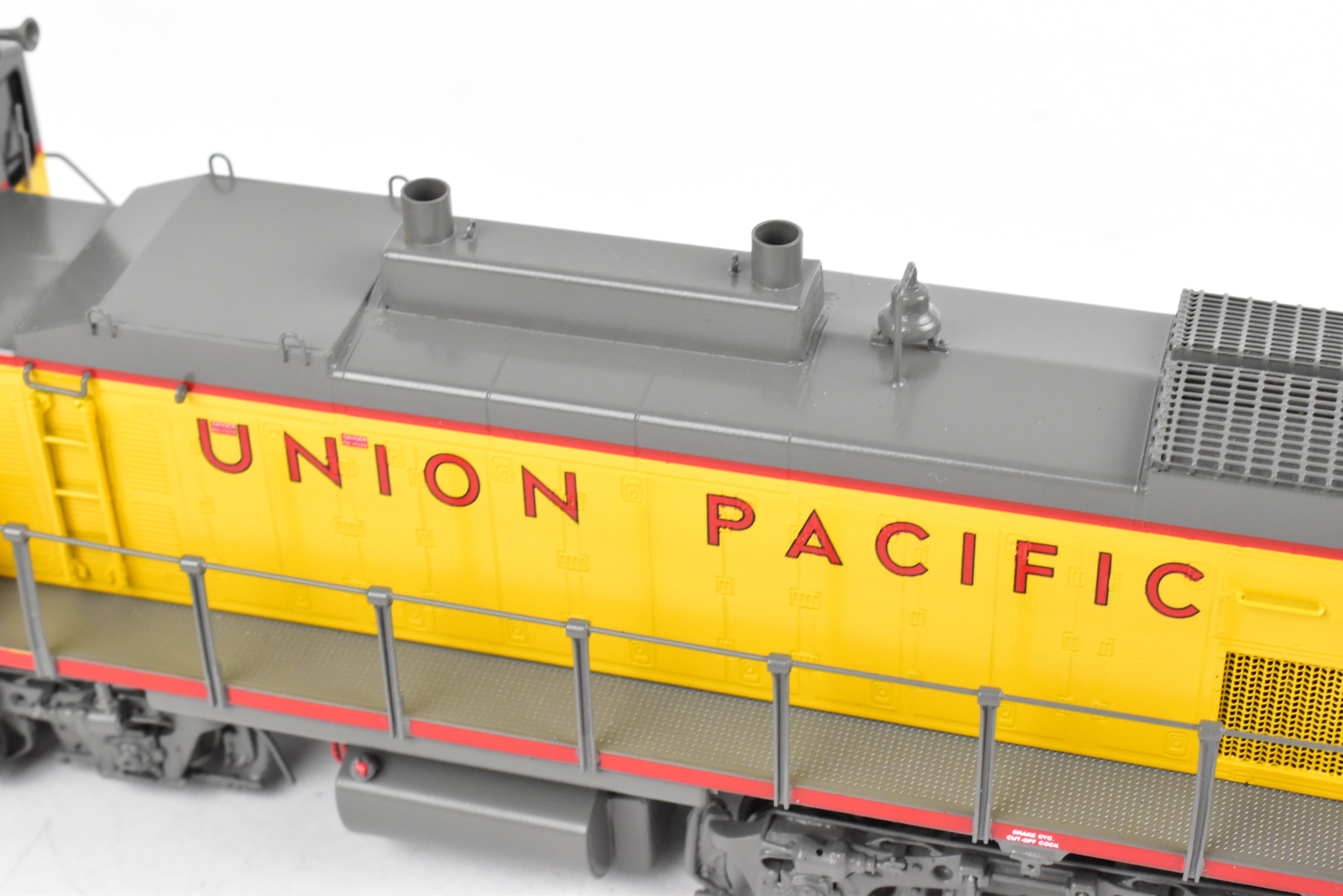 HO Scale Brass Model Train - Overland Models Inc. Union Pacific EMD MP15AC (formerly MKT) Freight Locomotive in Striking Yellow/Gray Color Scheme, Road Number 1396