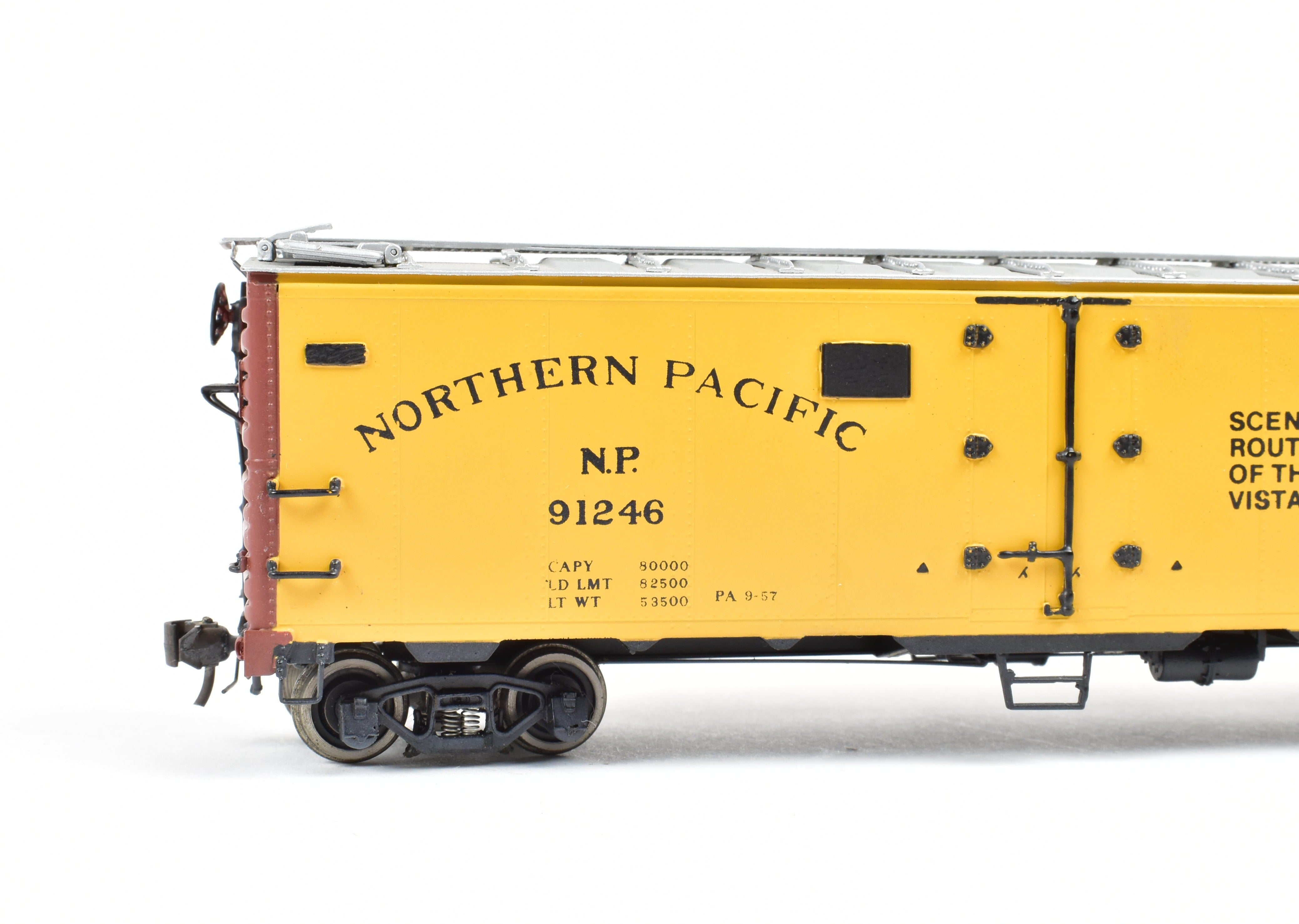 HO Scale Brass CIL - Challenger Imports North Pacific Steel Ice Refrigerator Freight/Passenger Car with Light Weathering and 'Scenic Route of The Vista - Dome North Coast Limited' Design