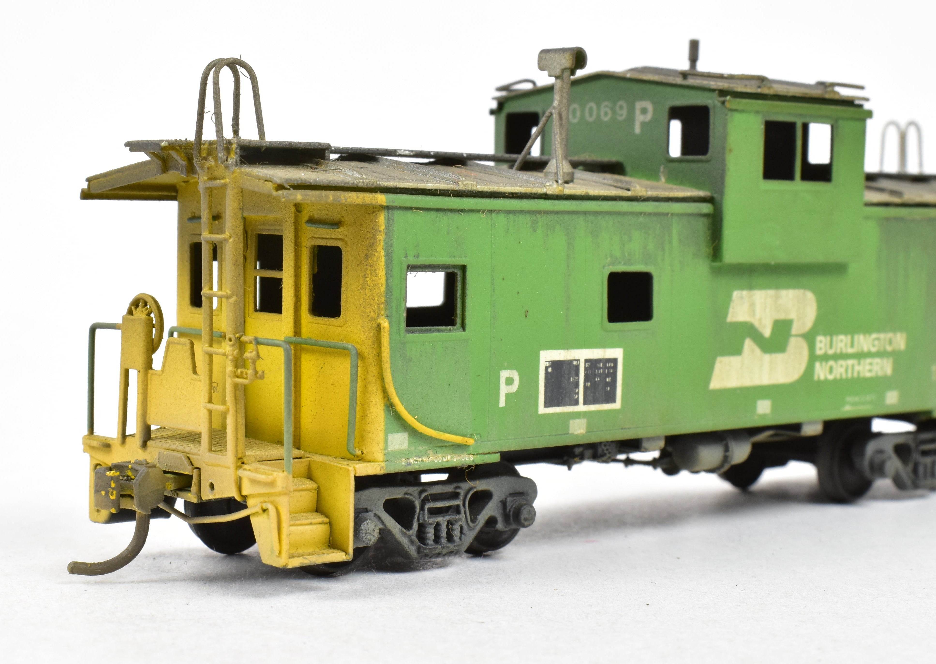 HO Scale Brass Oriental Limited Burlington Northern X Caboose X96 - 155 Class Model with Custom Painting and Weathering Effect