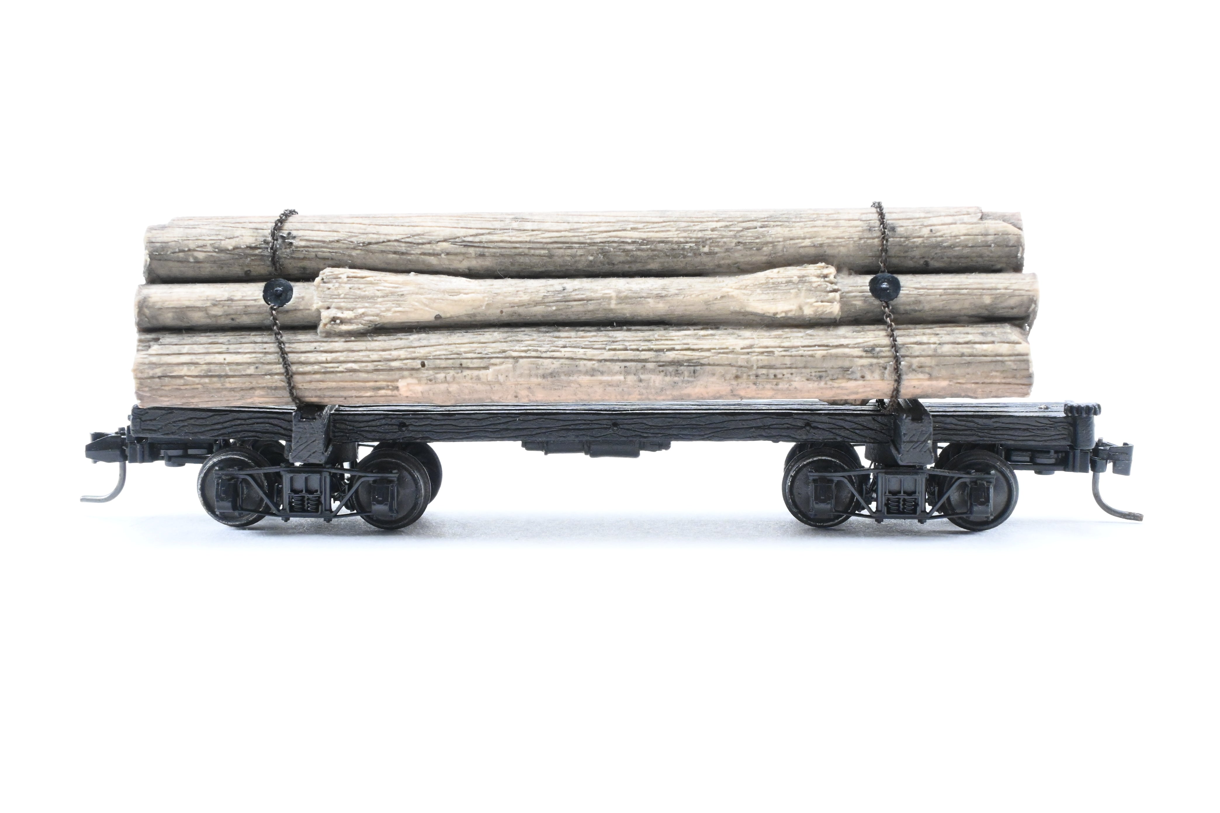 HOn3 Micro-Trains 30’ Factory-Painted Unlettered Skeleton Log Car with Load