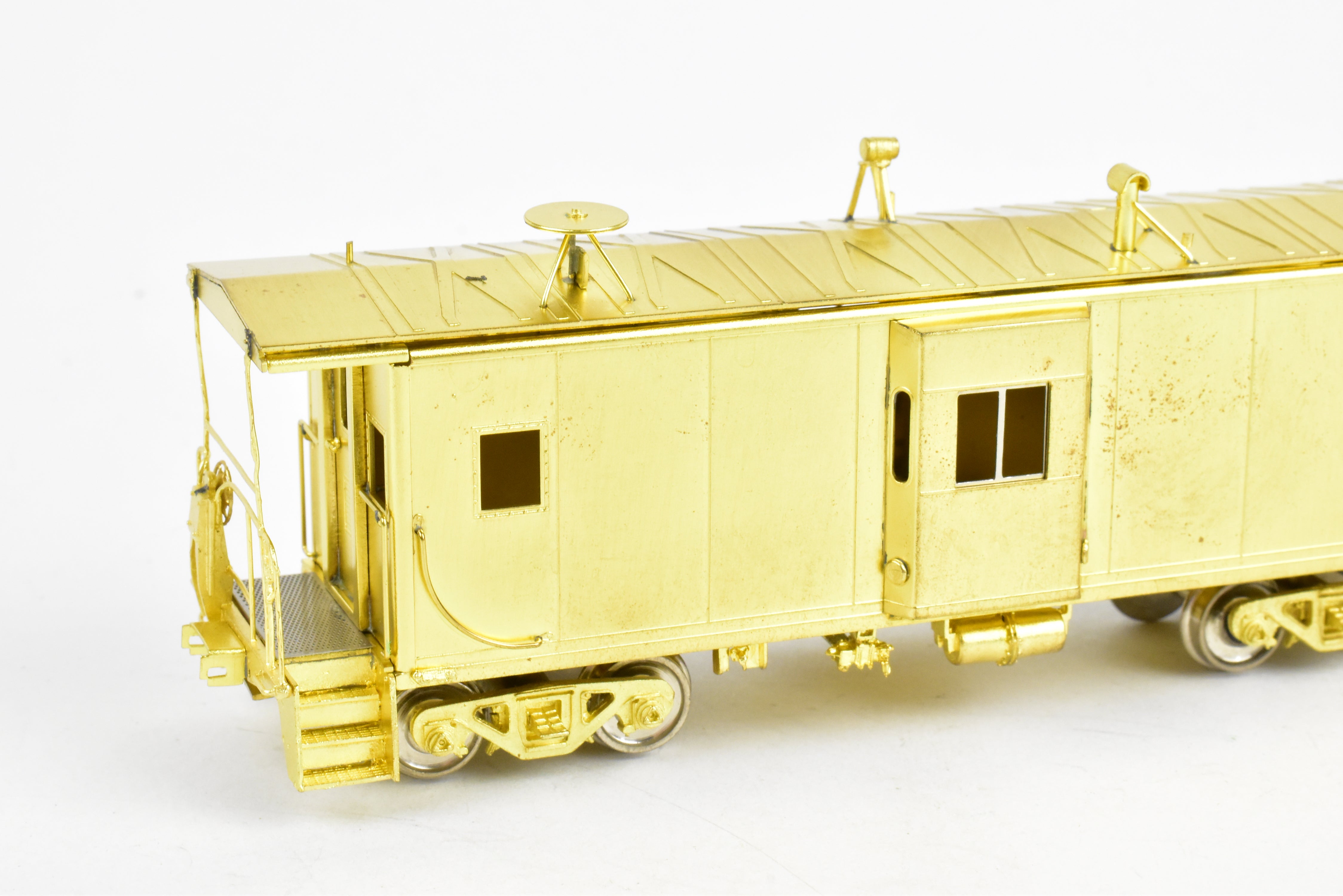 HO Scale Brass Model Train - Overland Models, Inc. (OMI) Southern Pacific (SP) C 50 - 7 Bay Window Caboose in the Series of #4600 - 4659