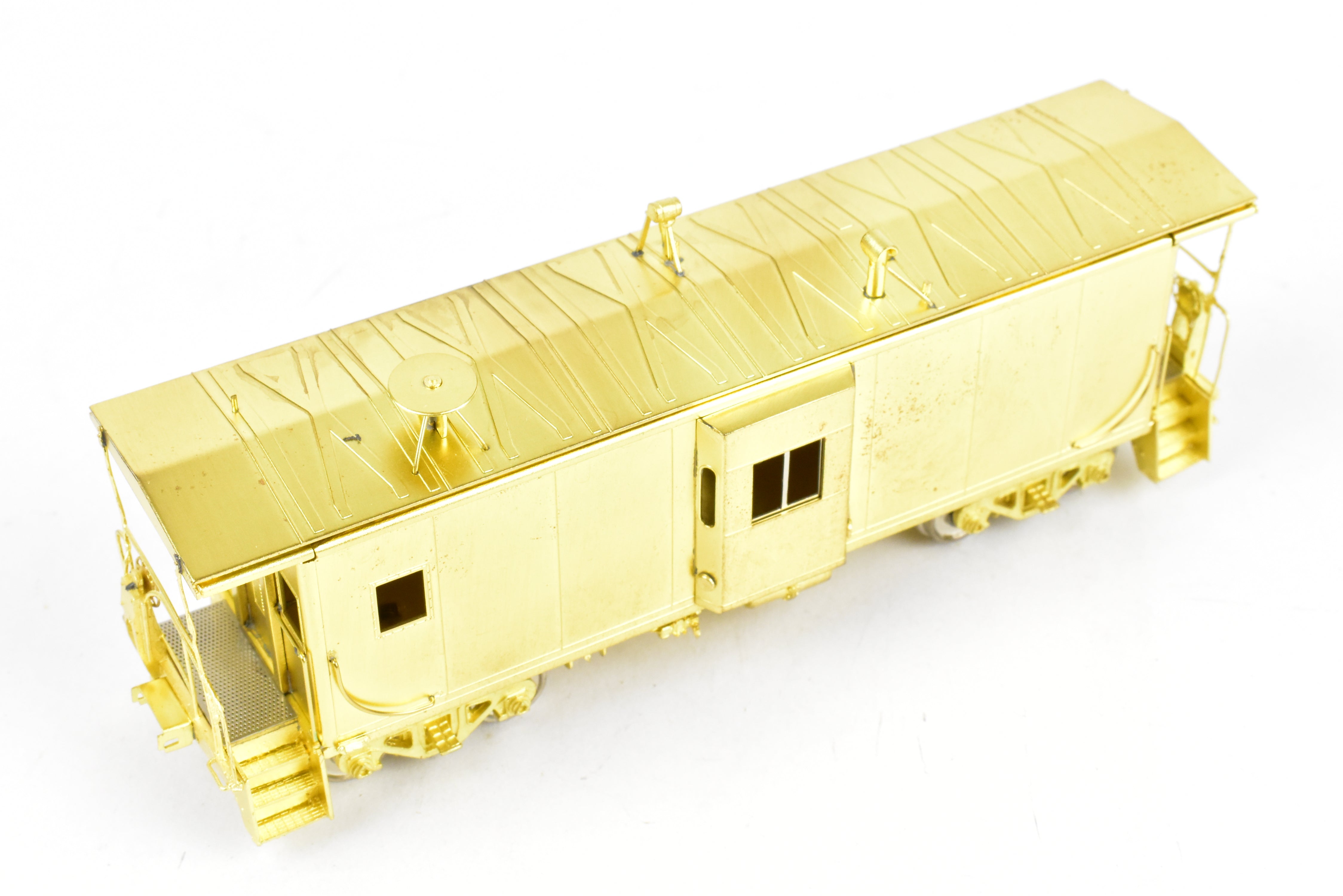 HO Scale Brass Model Train - Overland Models, Inc. (OMI) Southern Pacific (SP) C 50 - 7 Bay Window Caboose in the Series of #4600 - 4659