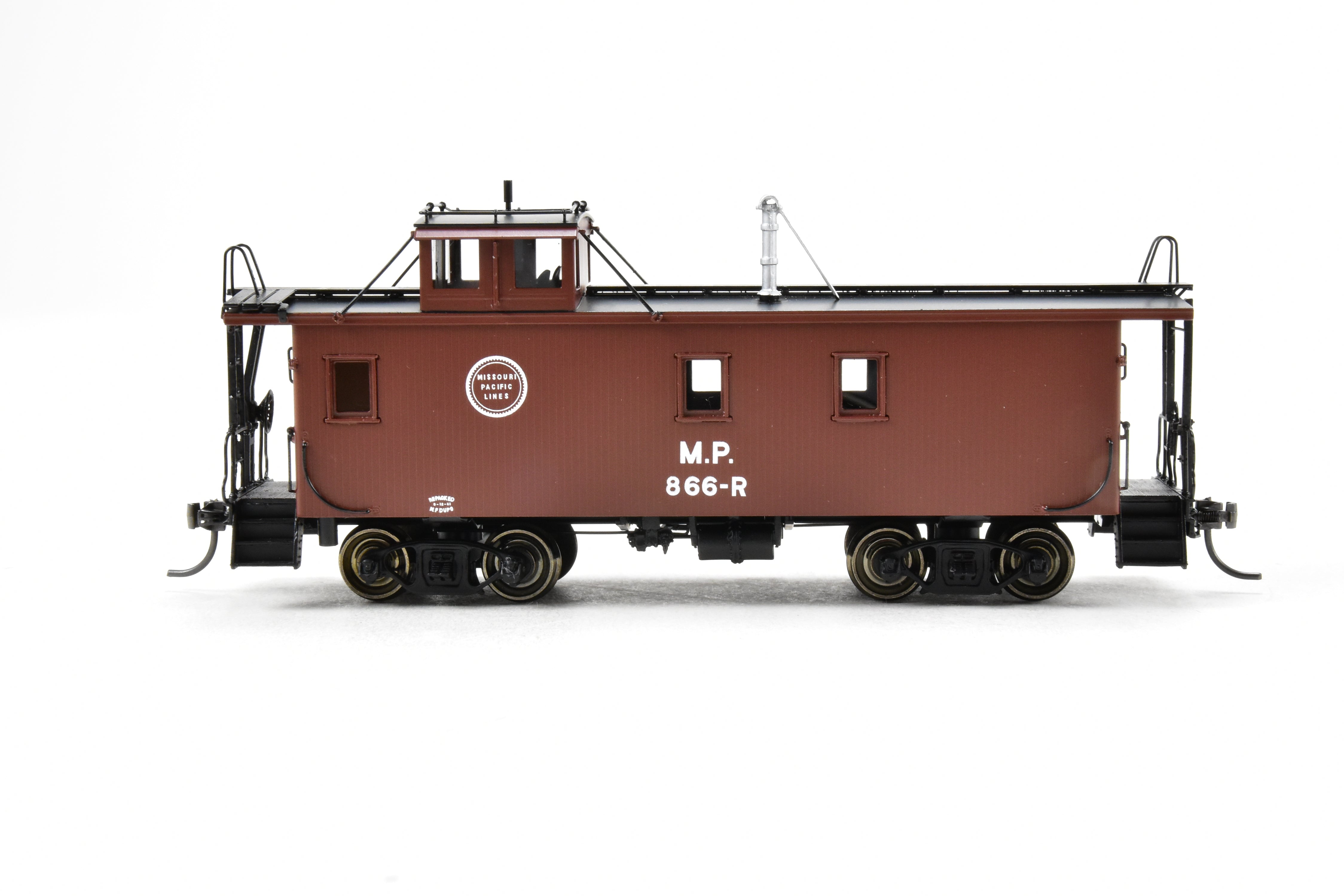 HO Scale Brass Missouri Pacific Wood - Side Caboose Model by Overland Models, Inc. with Angled Braces on Cupola and Antenna on Roof, Model Number #866R