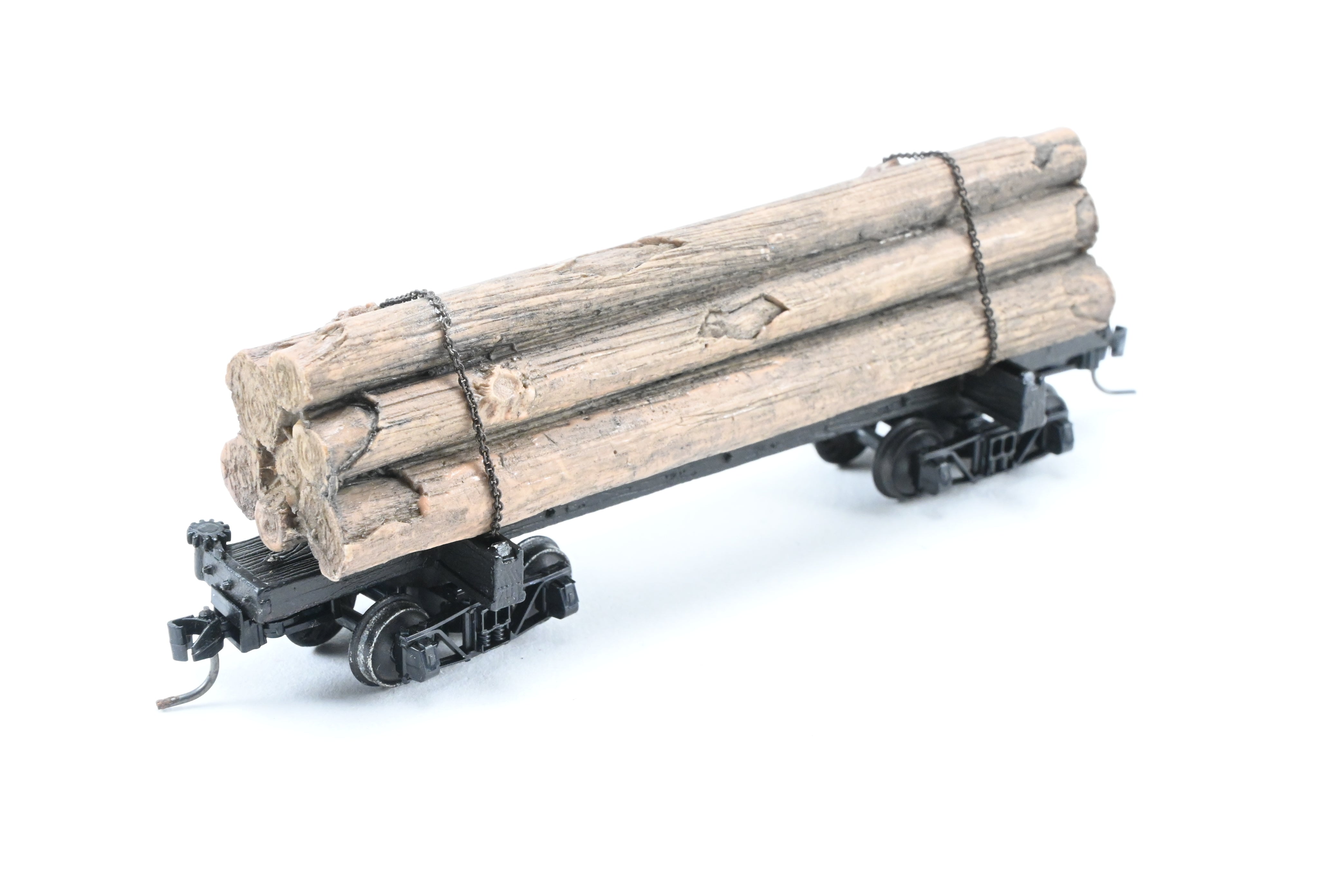 HOn3 Micro-Trains 30’ Factory-Painted Unlettered Skeleton Log Car with Load