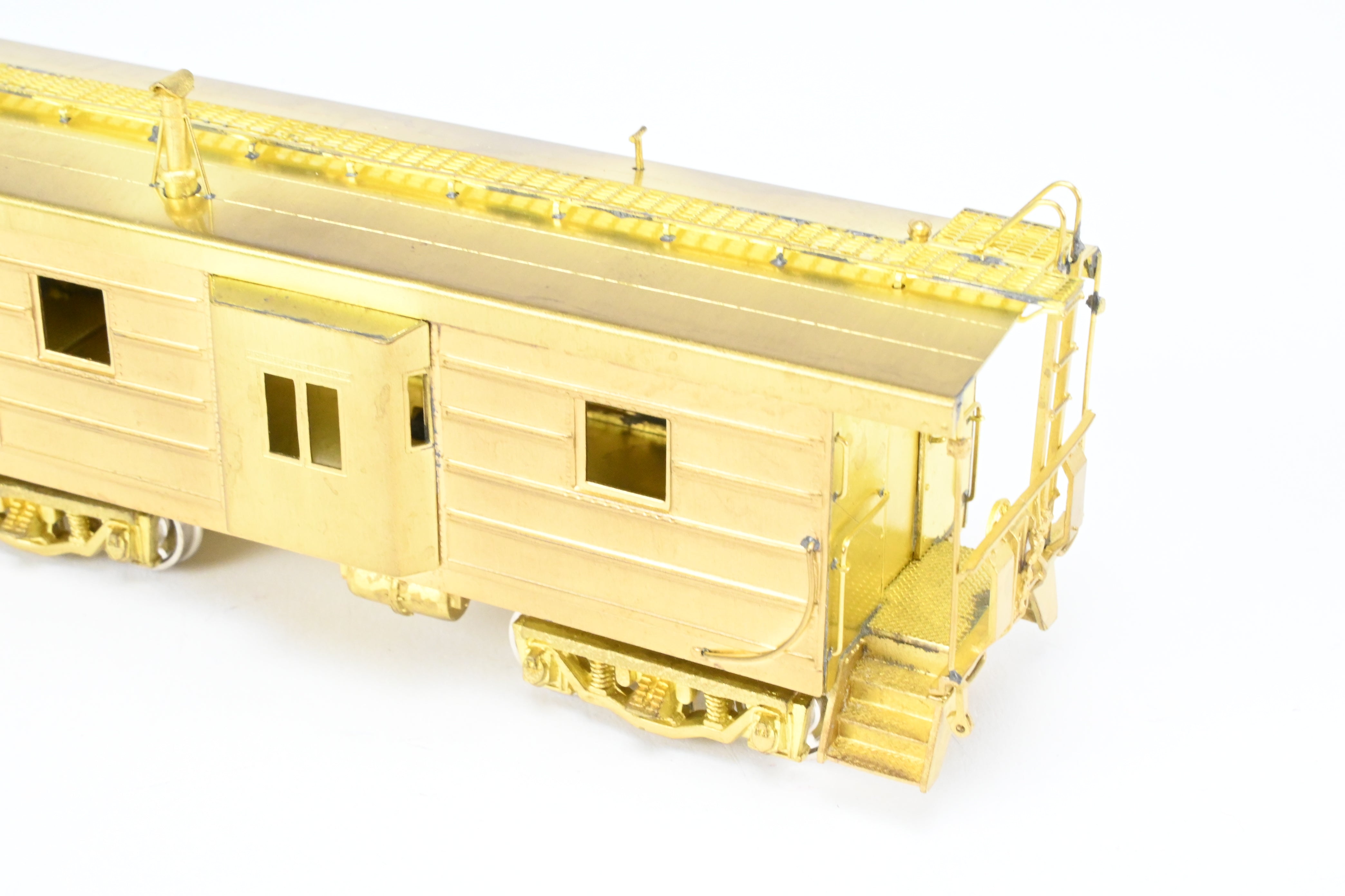 HO Brass OMI MILW - Milwaukee Road Bay Window Caboose with Drop Center Trucks (1991 Run)