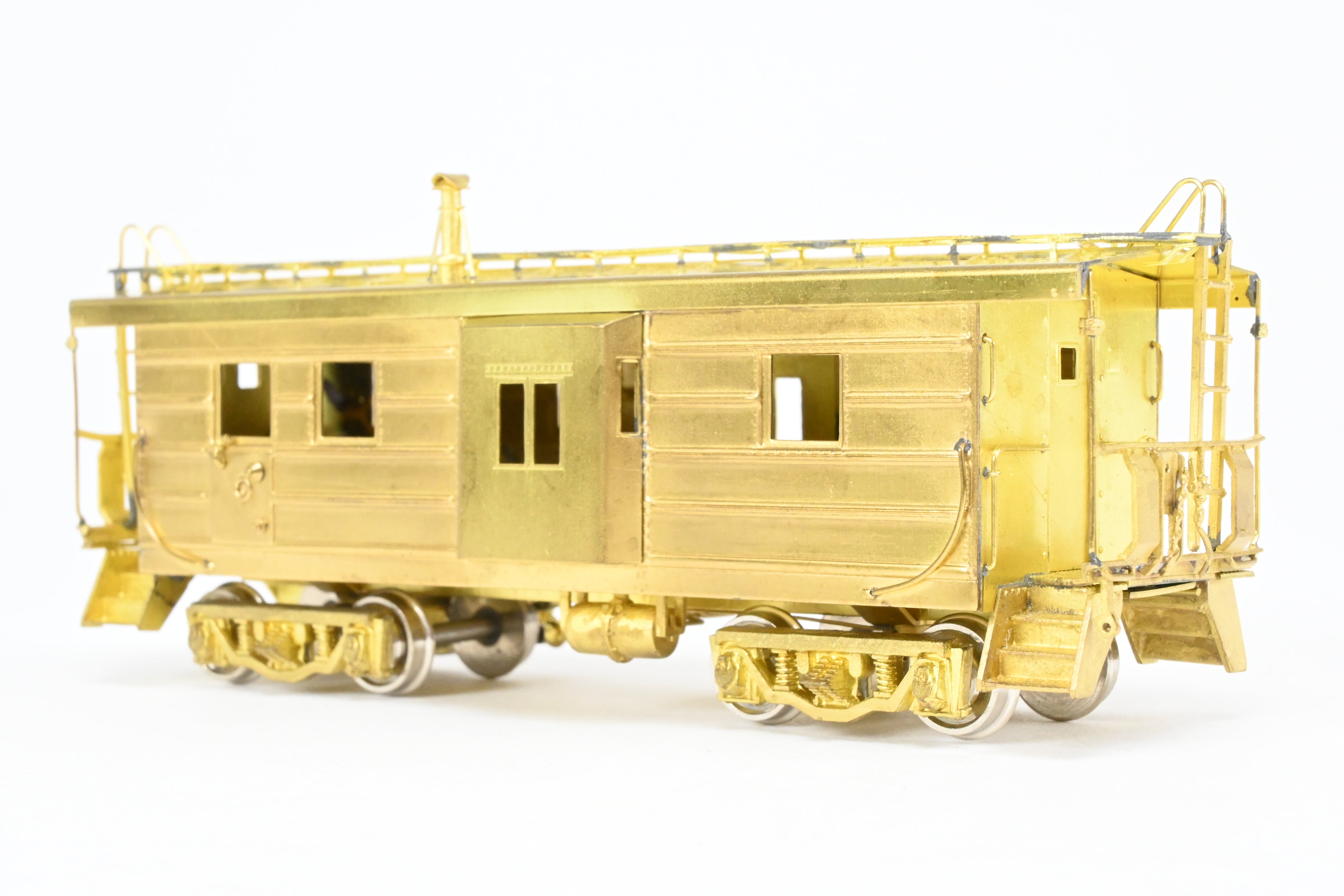 HO Brass OMI MILW - Milwaukee Road Bay Window Caboose with Drop Center Trucks (1991 Run)