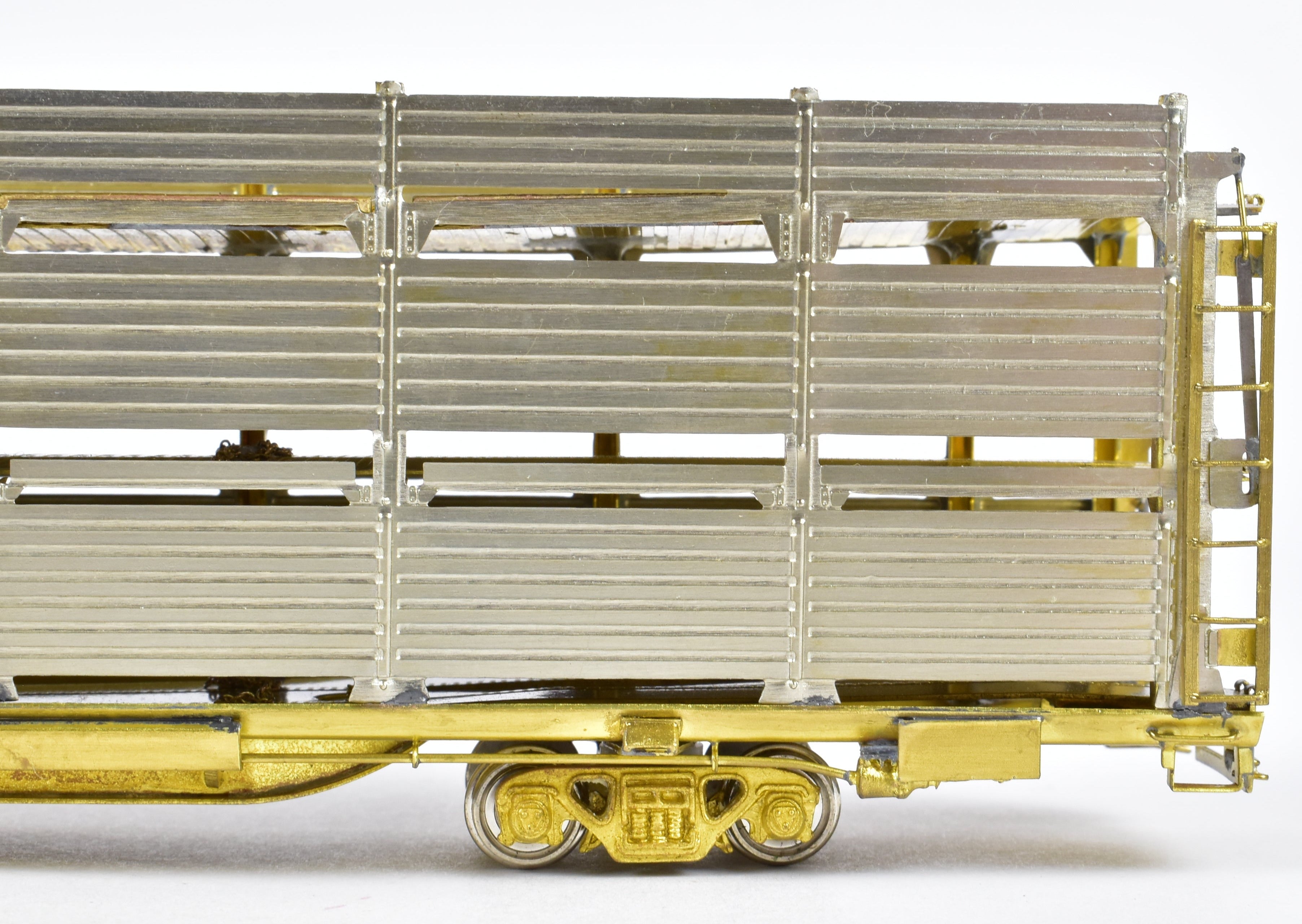 HO Scale Brass Tri - Level Auto Rack Model by Overland Models, Inc. (OMI) for Various Railroads like ATSF, BN, CR, N&W, and SP with Pressed Sides and Optional Roof
