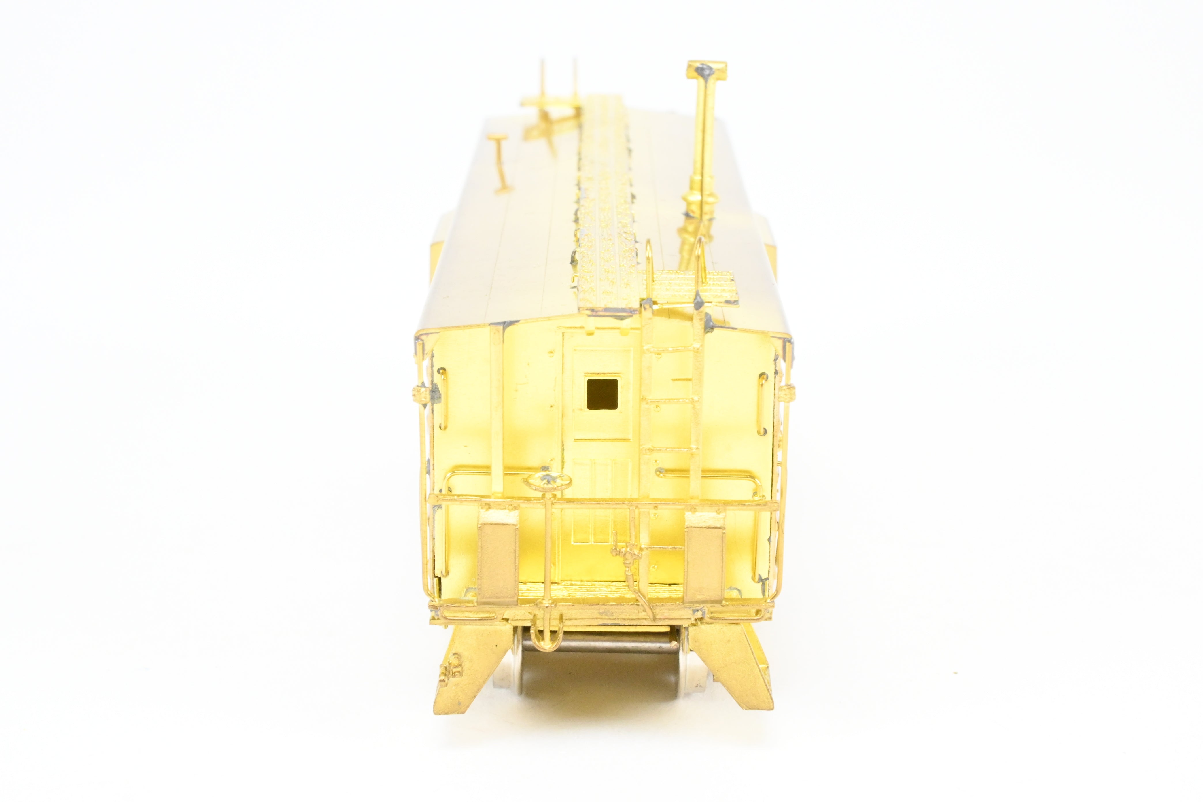HO Scale Brass OMI - Overland Models, Inc. Milwaukee Road (MILW) Bay Window Caboose with Straight Trucks, 1984 Production Run Model