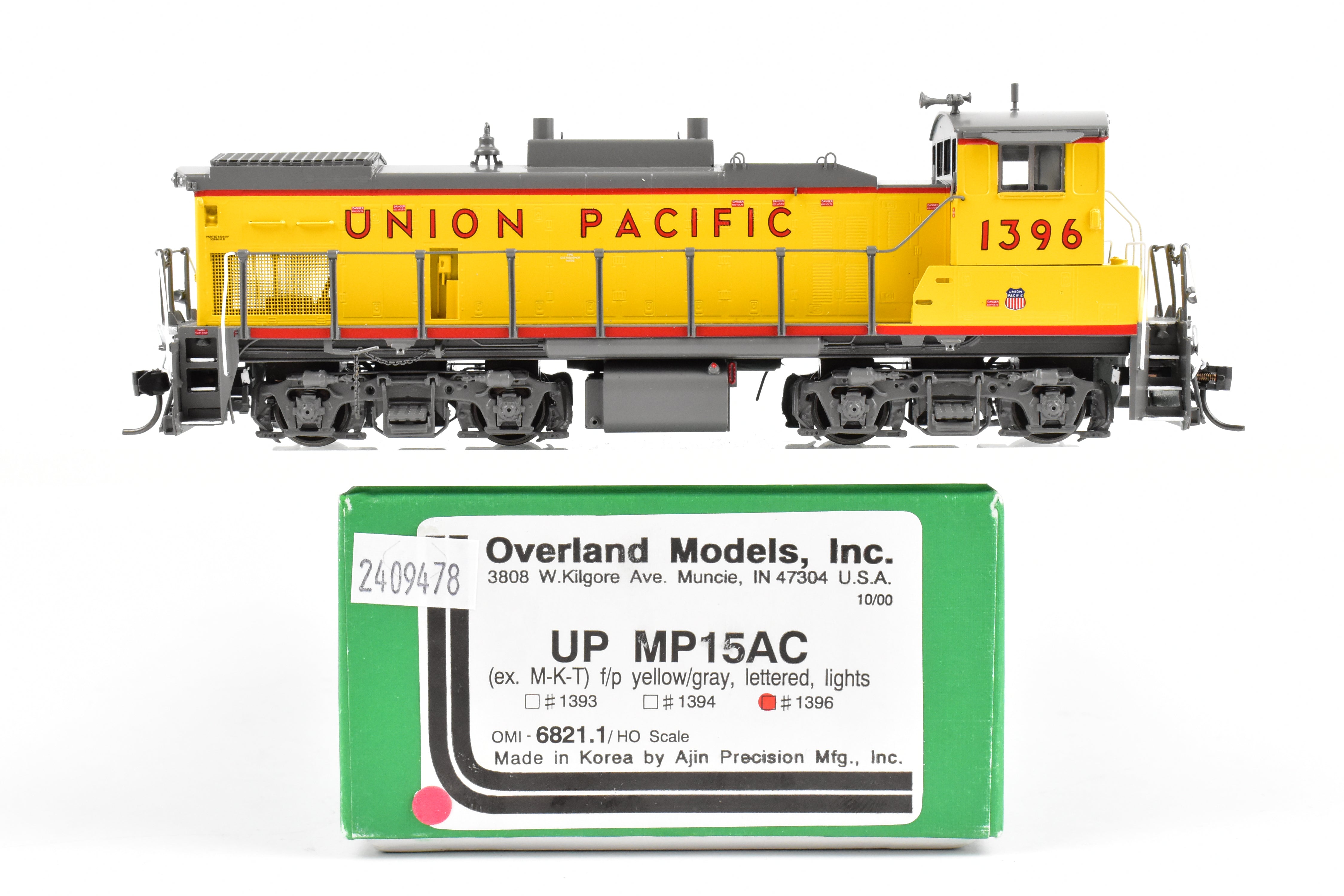 HO Scale Brass Model Train - Overland Models Inc. Union Pacific EMD MP15AC (formerly MKT) Freight Locomotive in Striking Yellow/Gray Color Scheme, Road Number 1396