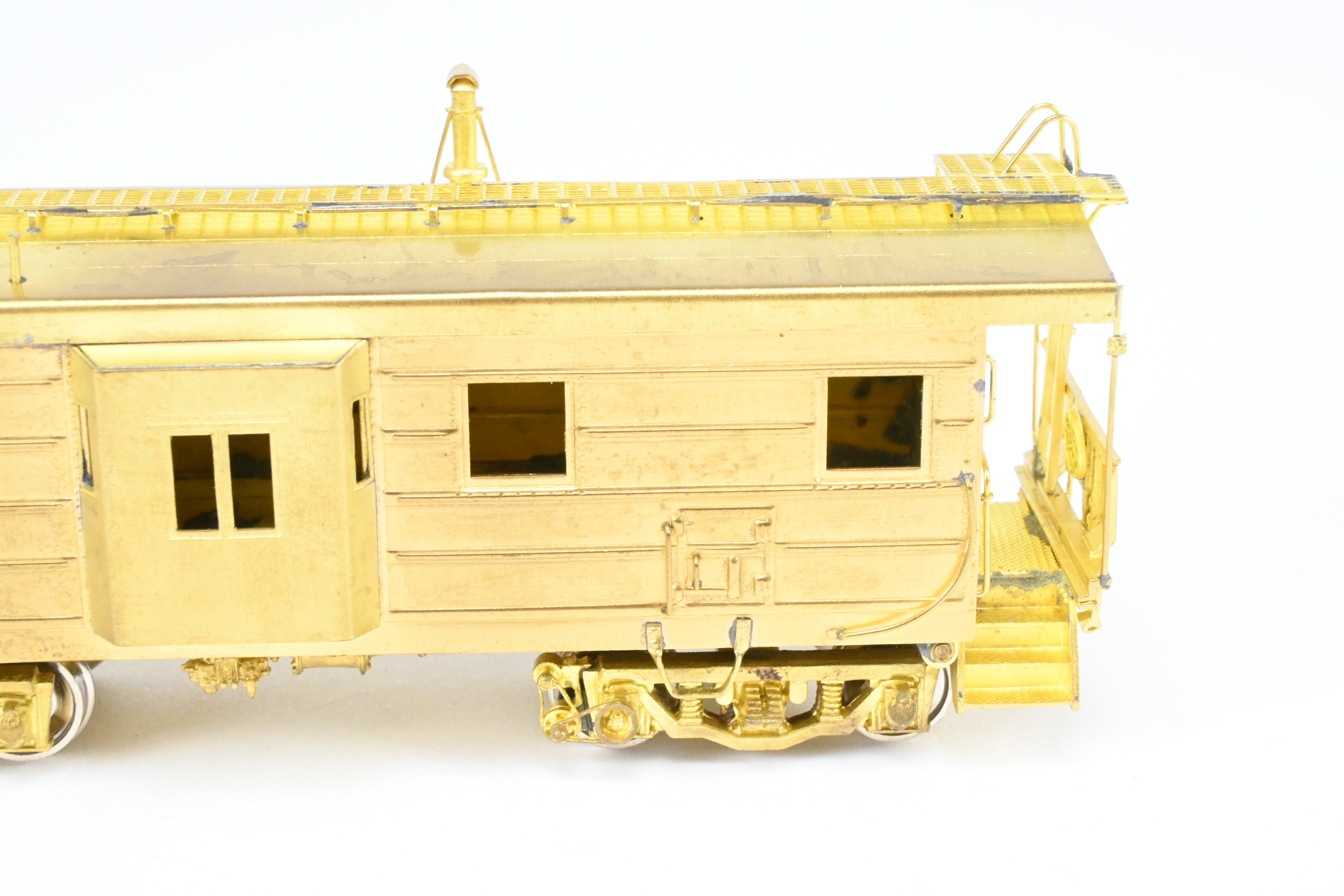 HO Brass OMI MILW - Milwaukee Road Bay Window Caboose with Drop Center Trucks (1991 Run)