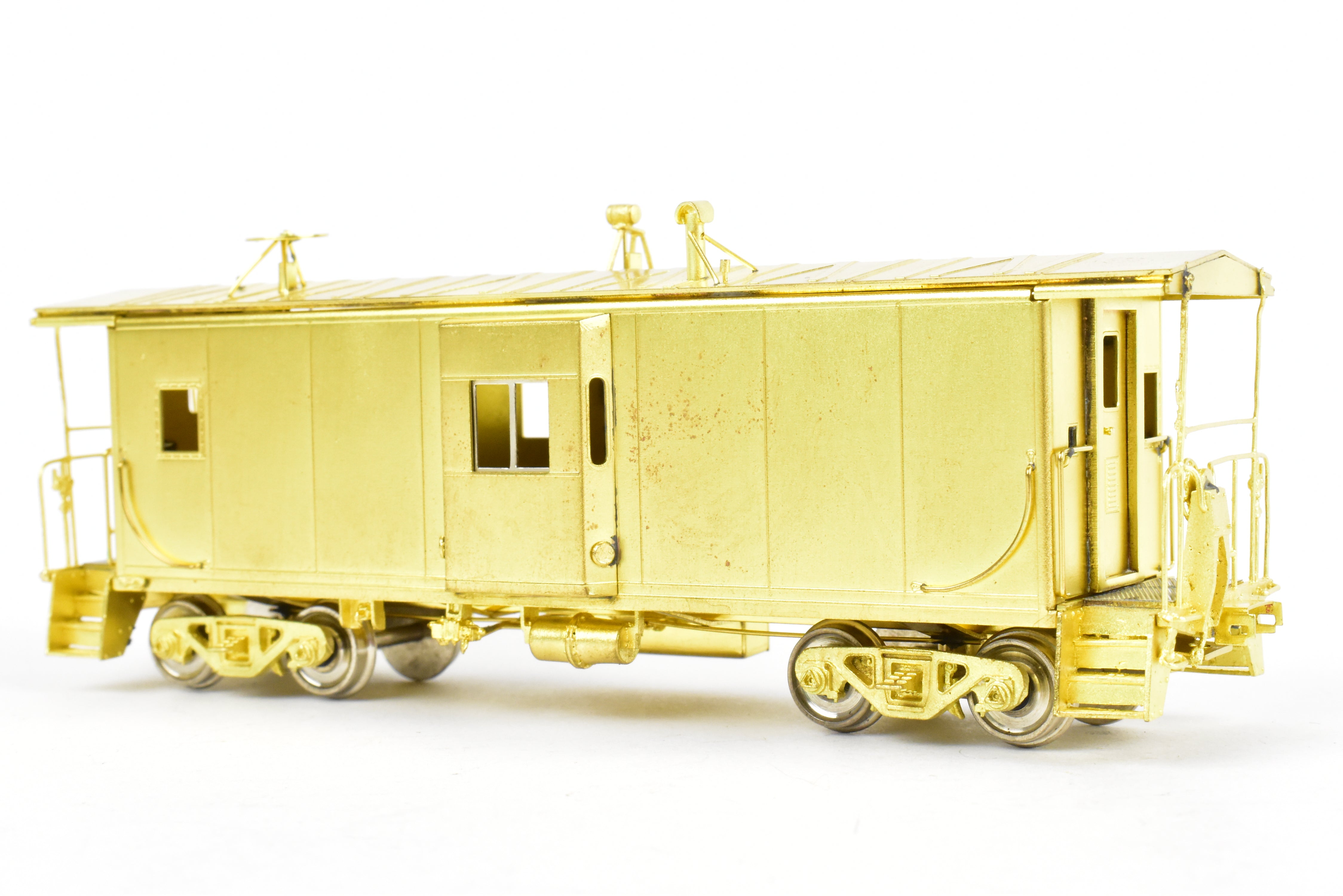 HO Scale Brass Model Train - Overland Models, Inc. (OMI) Southern Pacific (SP) C 50 - 7 Bay Window Caboose in the Series of #4600 - 4659