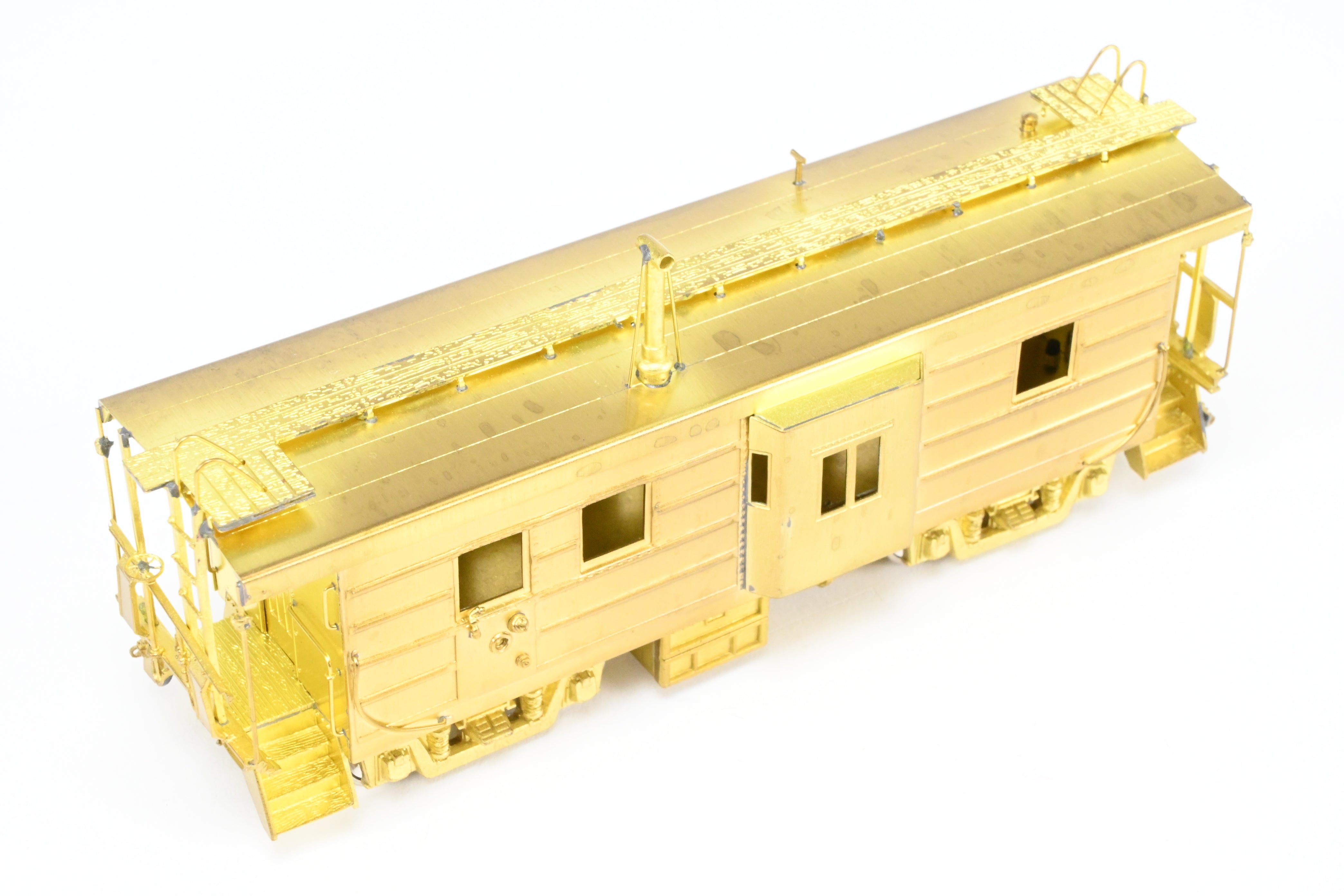 HO Scale Brass OMI - Overland Models, Inc. Milwaukee Road (MILW) Bay Window Caboose with Straight Trucks, 1984 Production Run Model