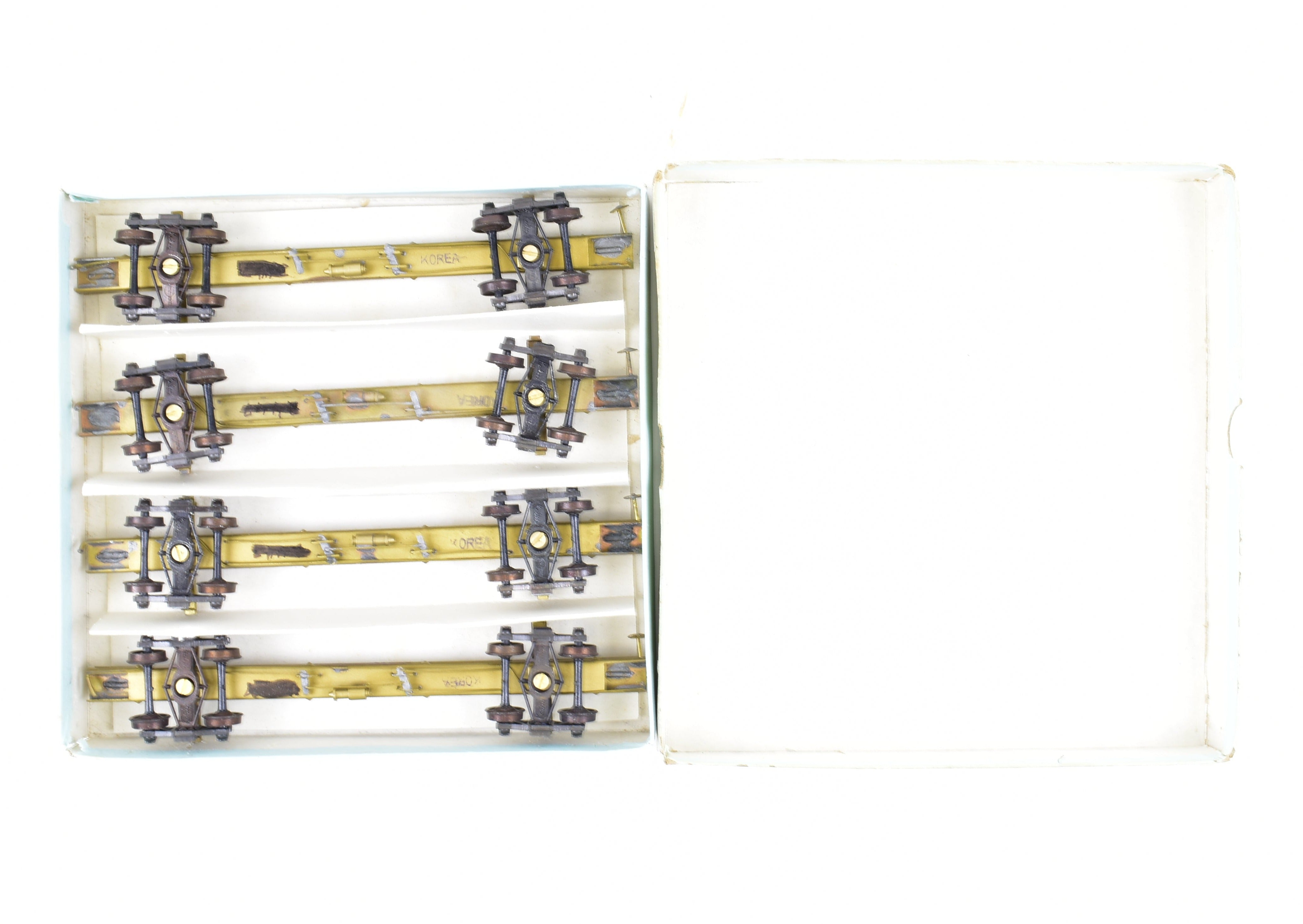 HO Brass 43' Skeleton Log Cars 4-Pack by Far East Distributors with Kadee Trucks #1