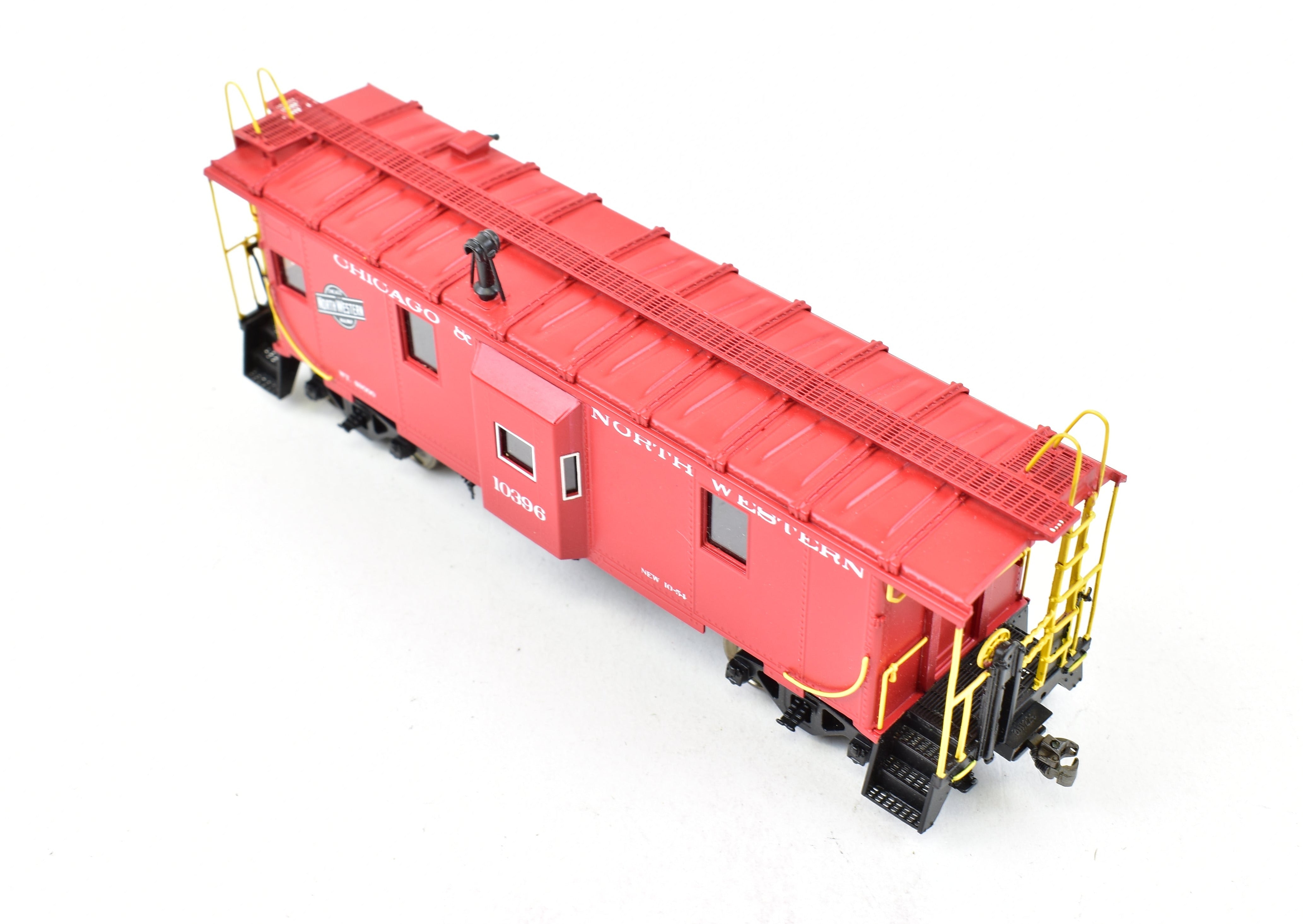 HO Scale Brass OMI - Overland Models, Inc. Chicago & North Western Steel Bay Window Caboose with Factory - Painted Bright Red Finish