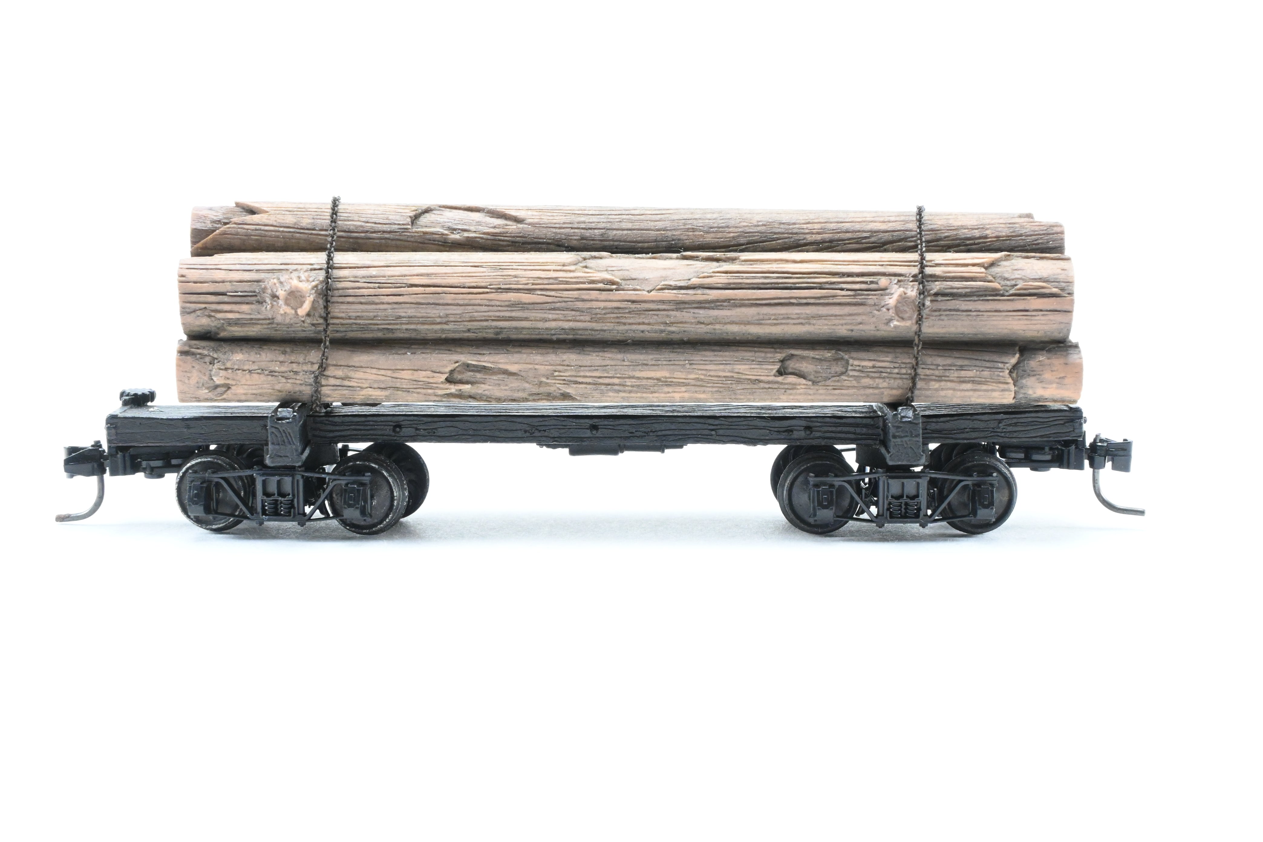 HOn3 Micro-Trains 30’ Factory-Painted Unlettered Skeleton Log Car with Load