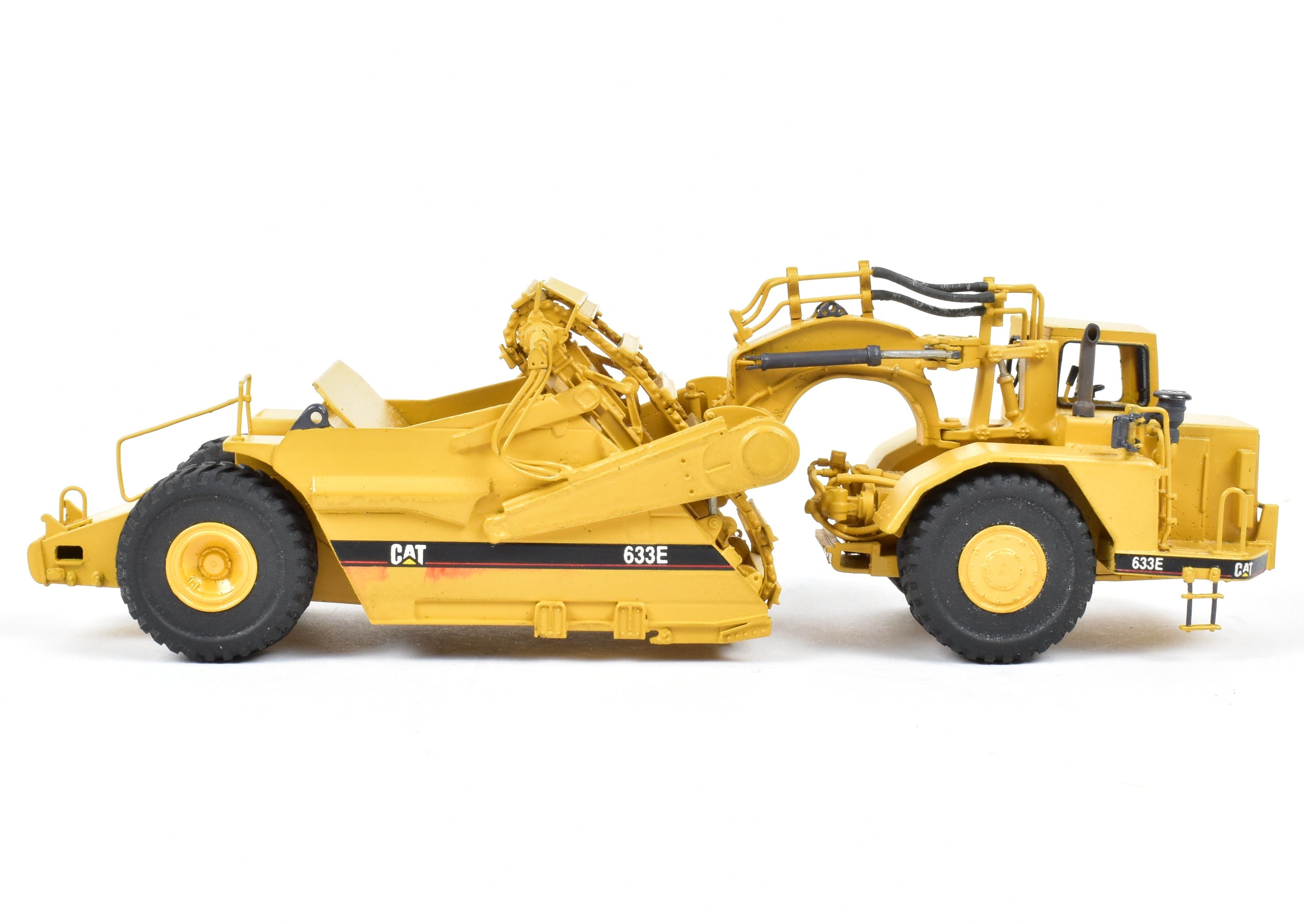 High - Quality HO Scale Brass Construction Model - Factory - Painted Yellow Caterpillar 633E Scraper by CCM Models