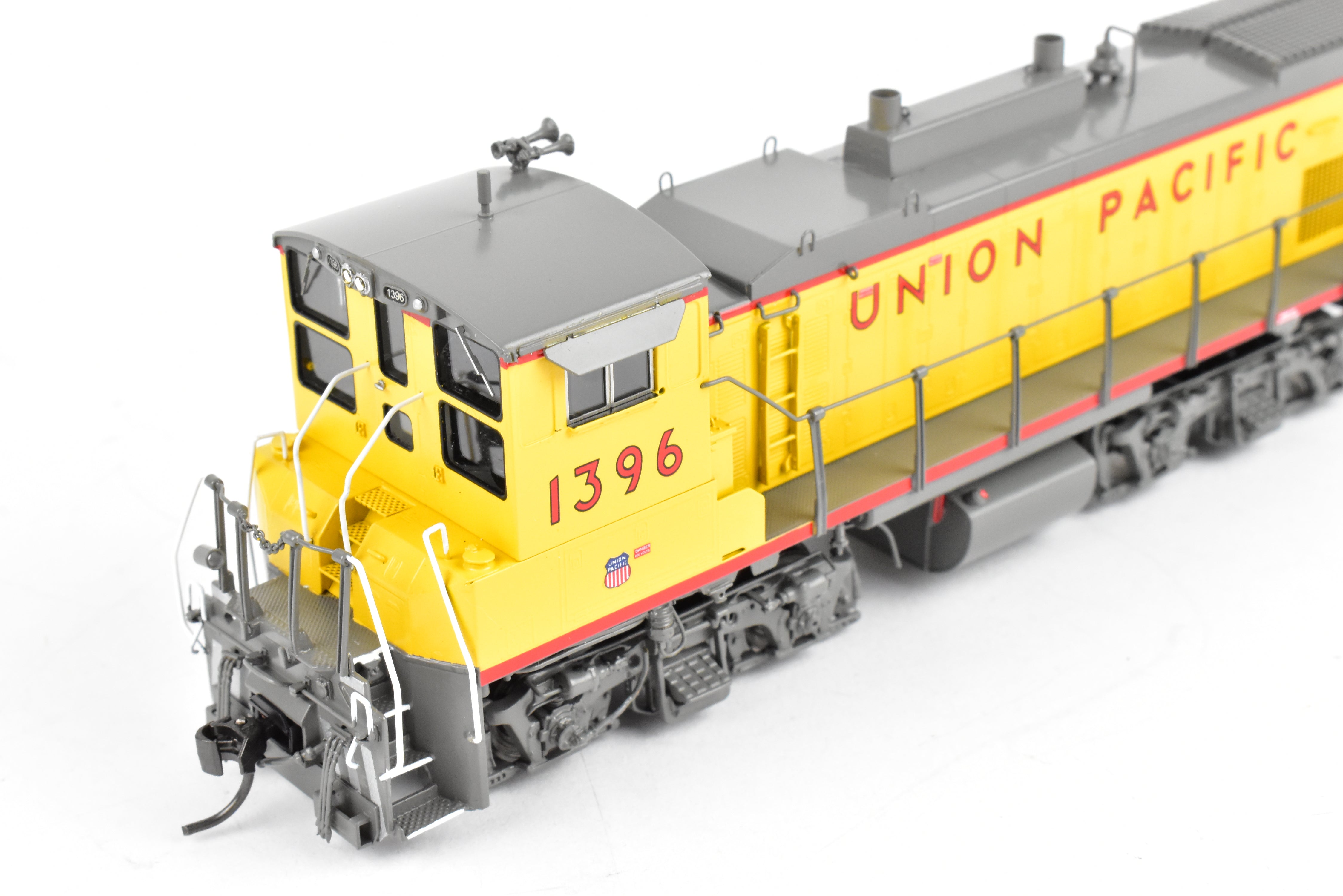 HO Scale Brass Model Train - Overland Models Inc. Union Pacific EMD MP15AC (formerly MKT) Freight Locomotive in Striking Yellow/Gray Color Scheme, Road Number 1396