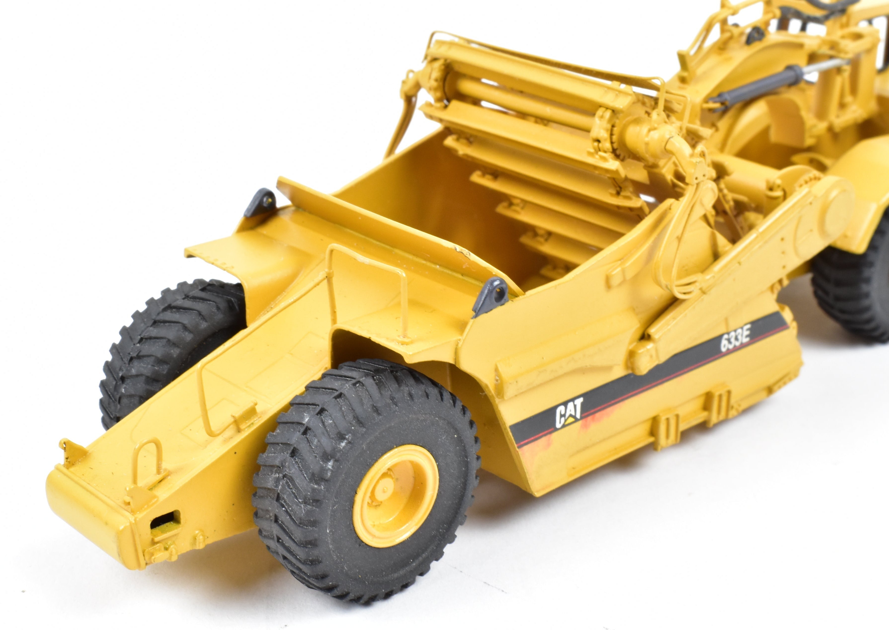 High - Quality HO Scale Brass Construction Model - Factory - Painted Yellow Caterpillar 633E Scraper by CCM Models