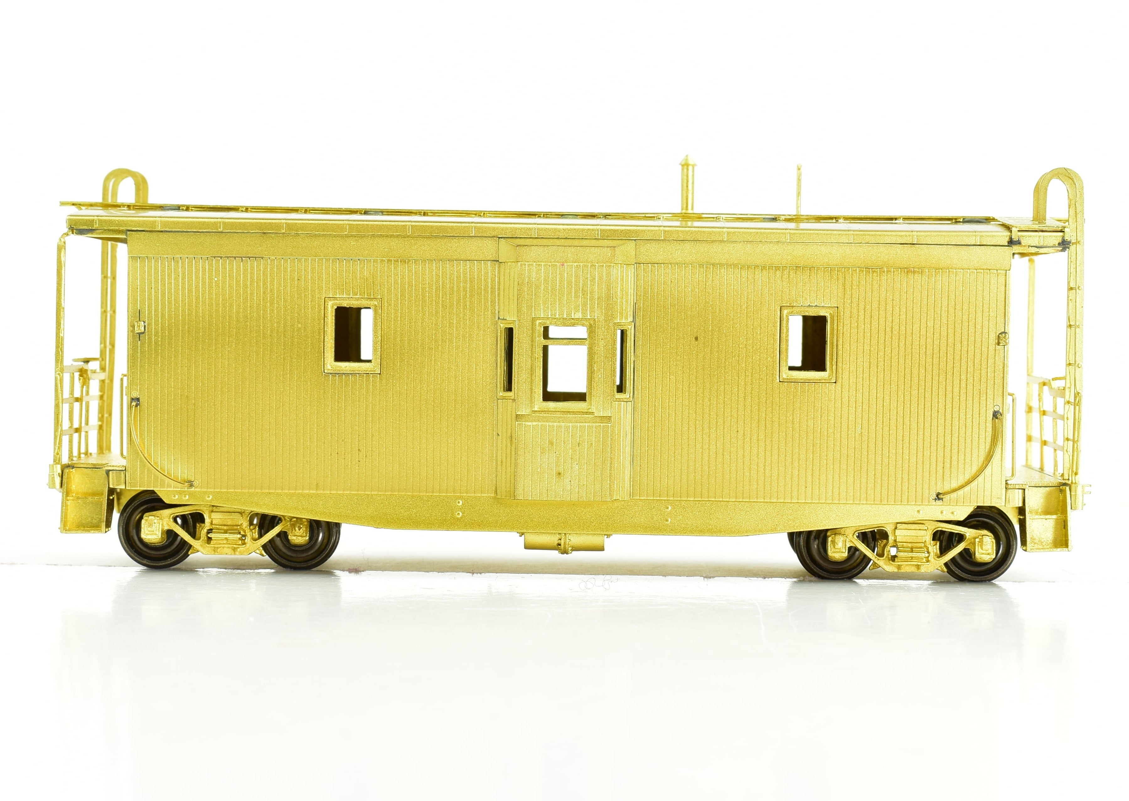 HO Scale Brass Northern Pacific Wood Bay Window Caboose by OMI Overland Models
