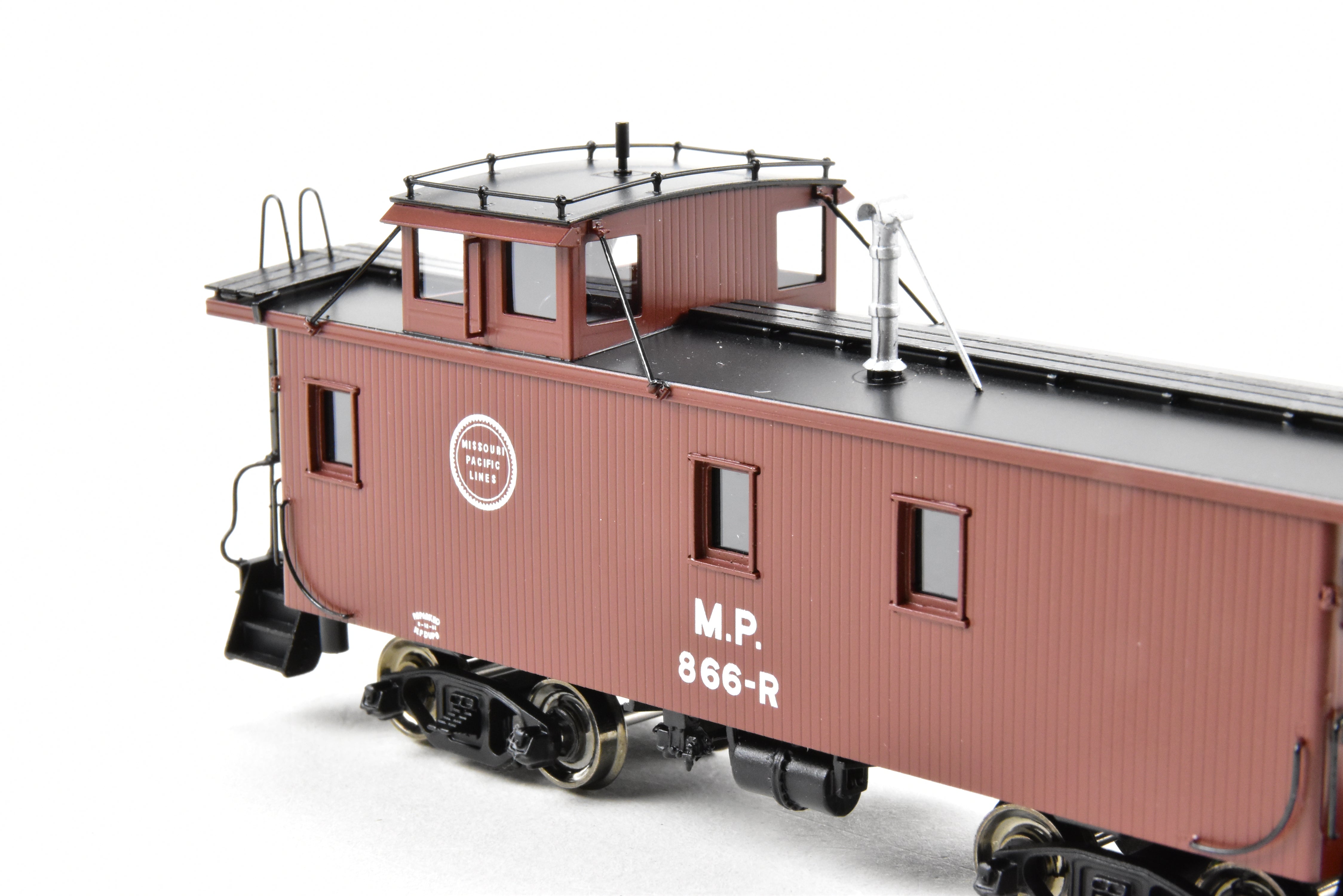 HO Scale Brass Missouri Pacific Wood - Side Caboose Model by Overland Models, Inc. with Angled Braces on Cupola and Antenna on Roof, Model Number #866R