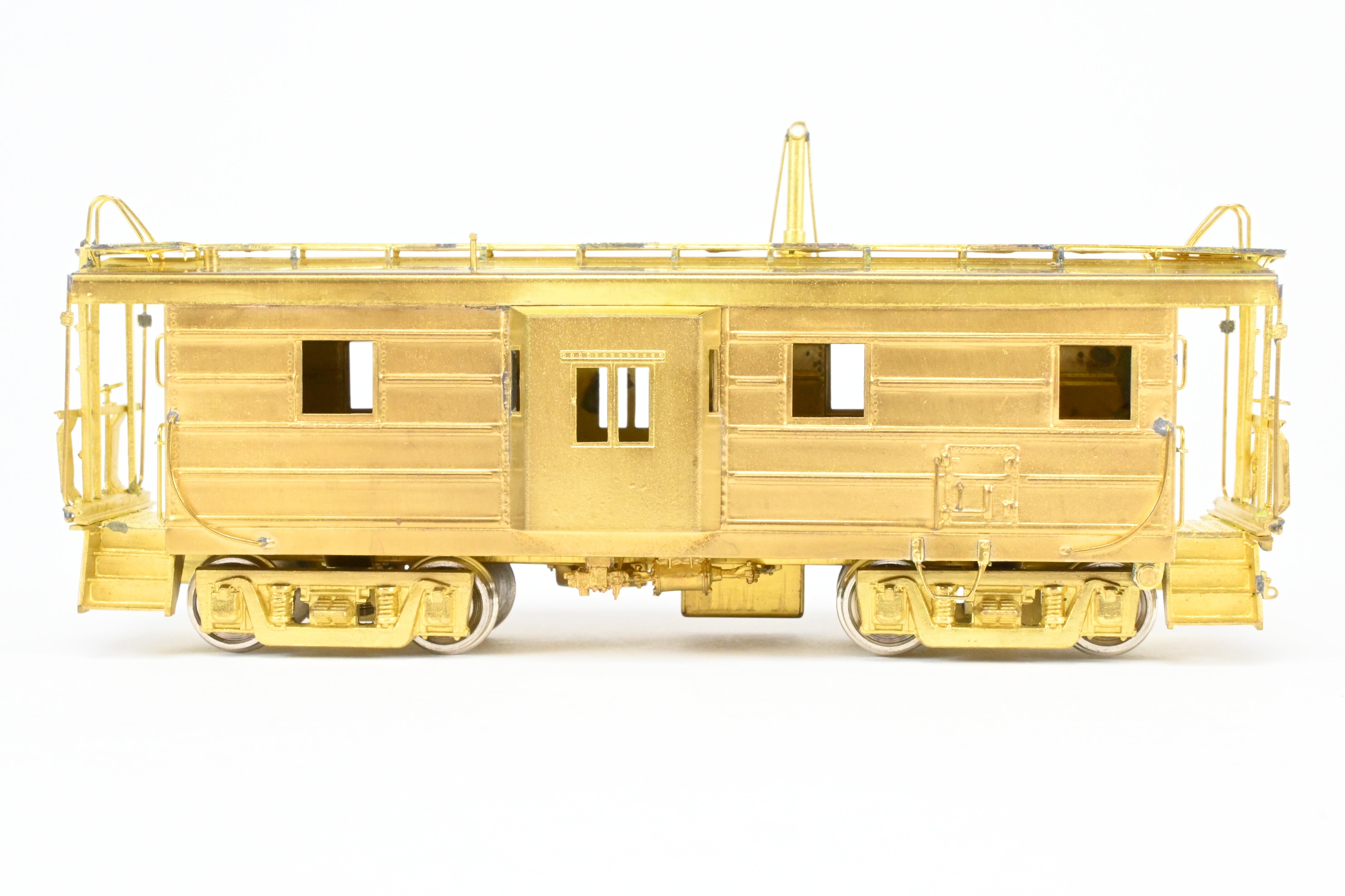 HO Scale Brass OMI - Overland Models, Inc. Milwaukee Road (MILW) Bay Window Caboose with Straight Trucks, 1984 Production Run Model